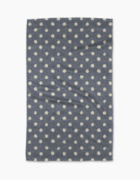 The Geometry Freckle Jean is a rectangular blue tea towel with evenly spaced white polka dots. Quick-drying and practical, it adds charm to any kitchen.