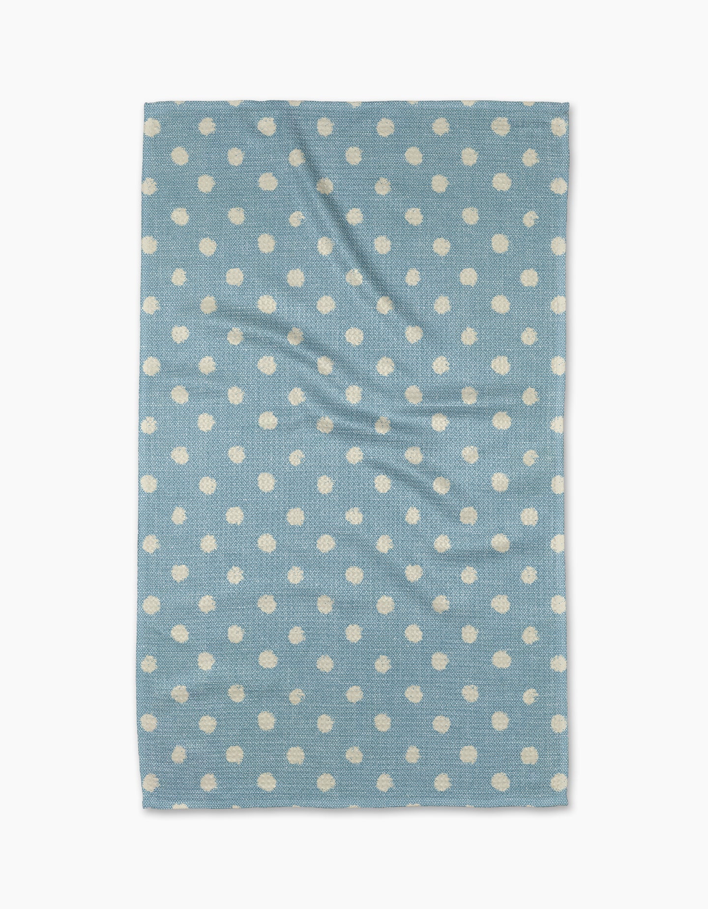 The Geometry Freckle Light Blue towel, featuring evenly spaced white polka dots on a rectangular light blue quick-drying fabric, is laid flat on a white background—ideal as a stylish and functional kitchen tea towel.