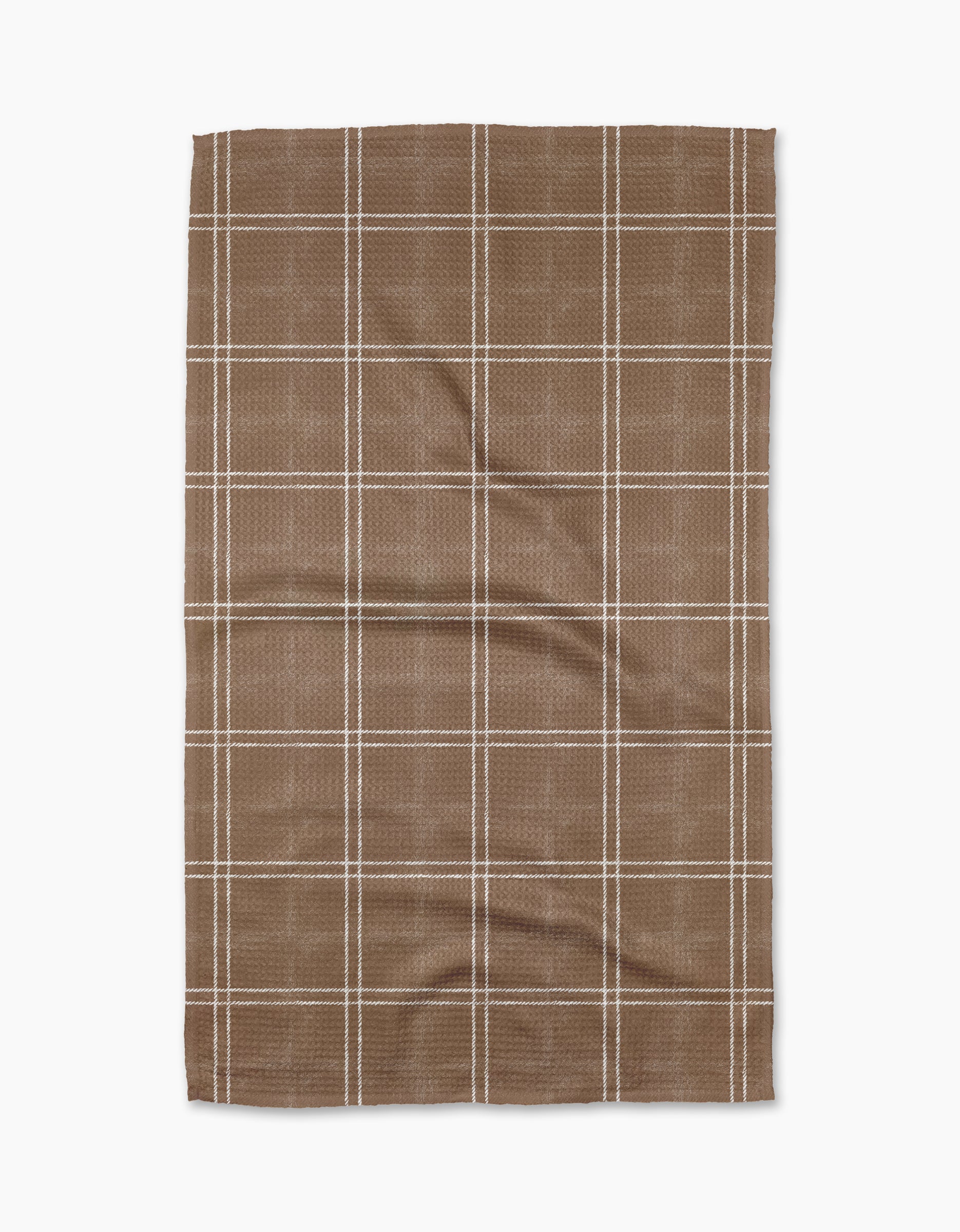 The Geometry Hearth Chestnut is a brown kitchen tea towel with a white checkered grid, laid flat on a white background. Made from recycled materials, its fabric is slightly textured with visible creases.