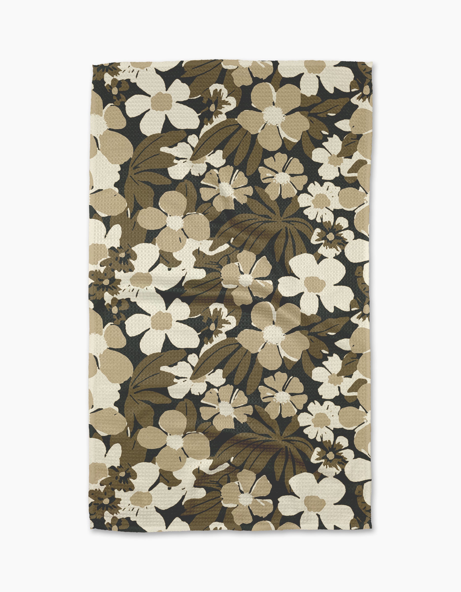 The Marlo Brown tea towel by Geometry is rectangular, made from recycled materials, and features beige, brown, and cream floral patterns on a dark background, shown flat against a white surface.