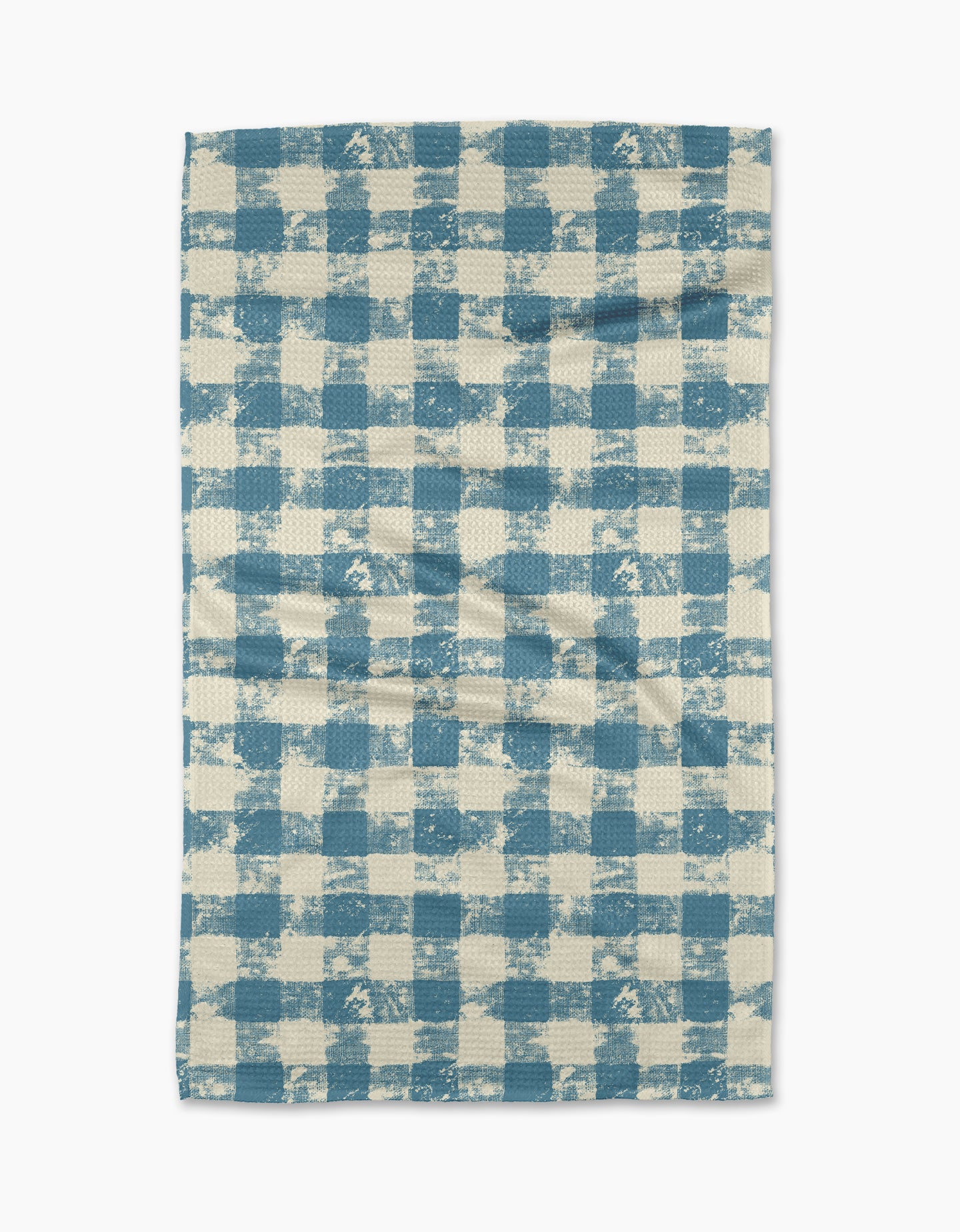The Patch Denim tea towel by Geometry features a blue and white checkered pattern with a textured, slightly uneven design, displayed flat on a white background.