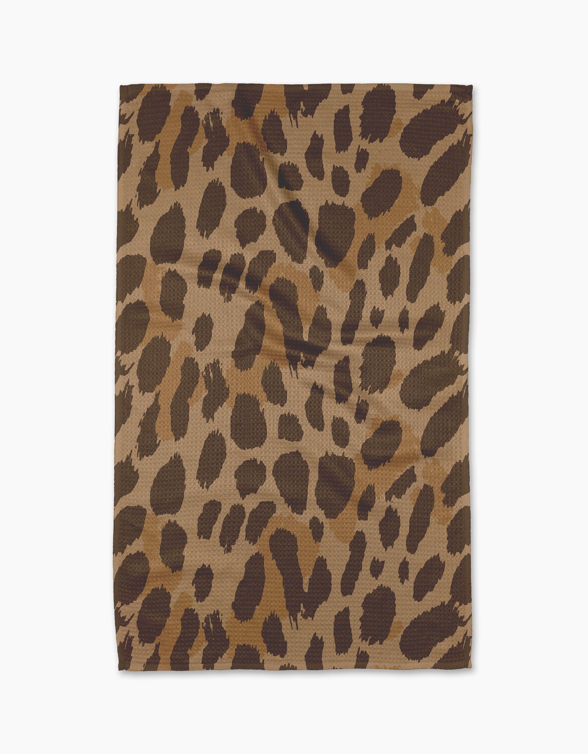 The Geometry Roam tea towel, crafted from recycled materials and showcasing a brown and black leopard print, is displayed flat on a white background.