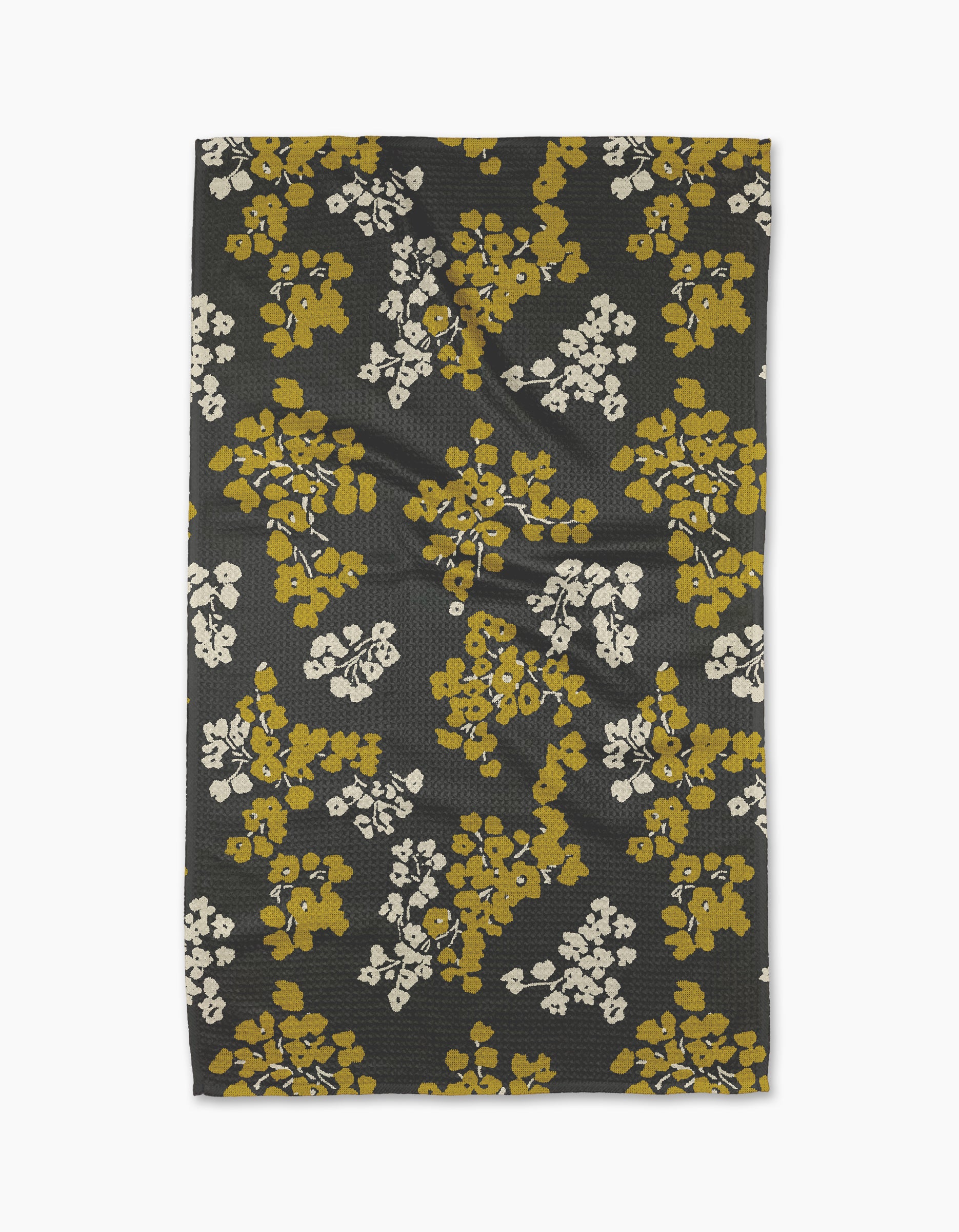 Geometry’s Sonnet Ember tea towel features a black background with mustard yellow and white floral clusters. Made from recycled materials, it’s a stylish and eco-friendly choice for your kitchen.