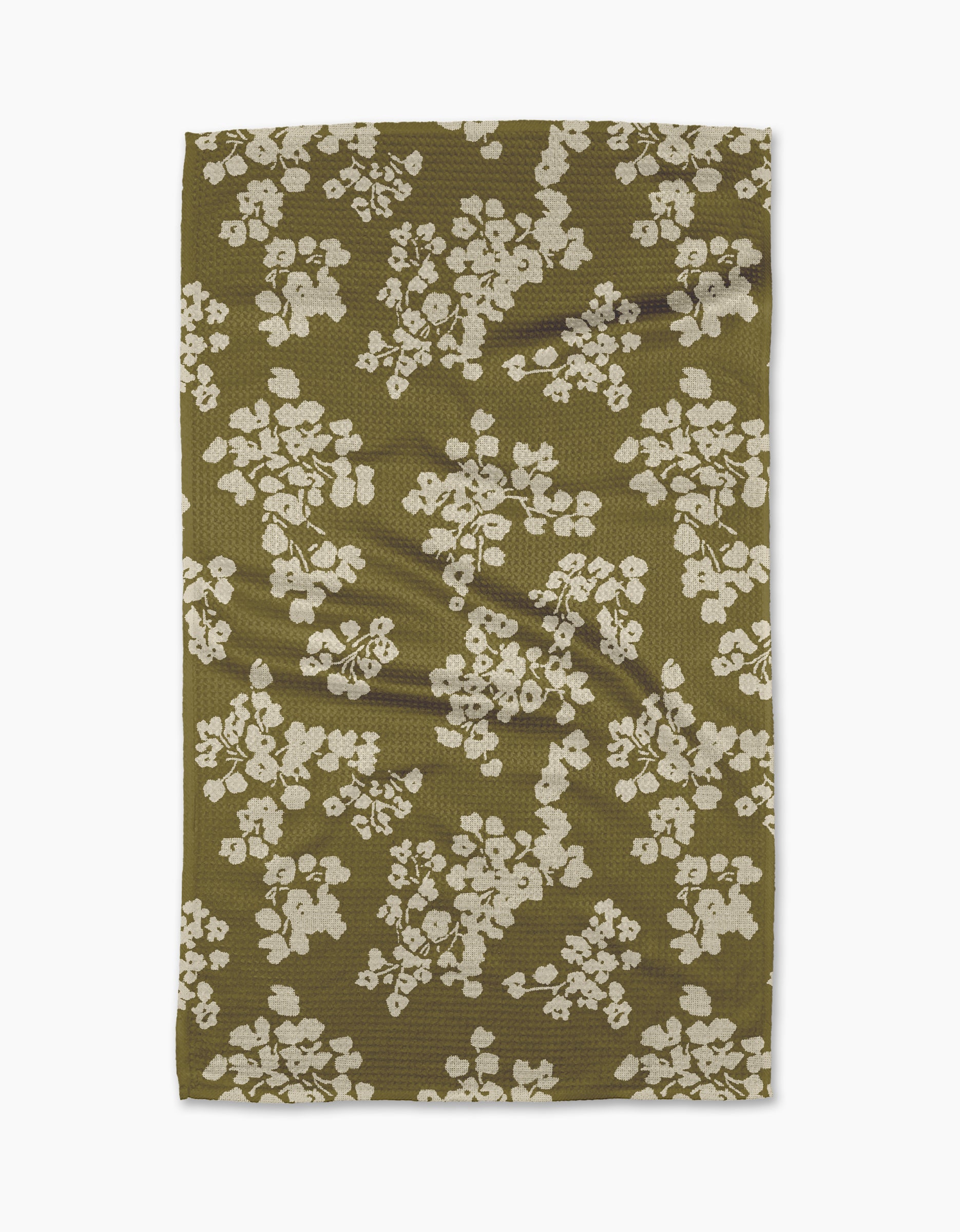 The Geometry Sonnet Olive recycled kitchen towel features a textured olive green surface with irregular white floral clusters, shown flat against a white background.