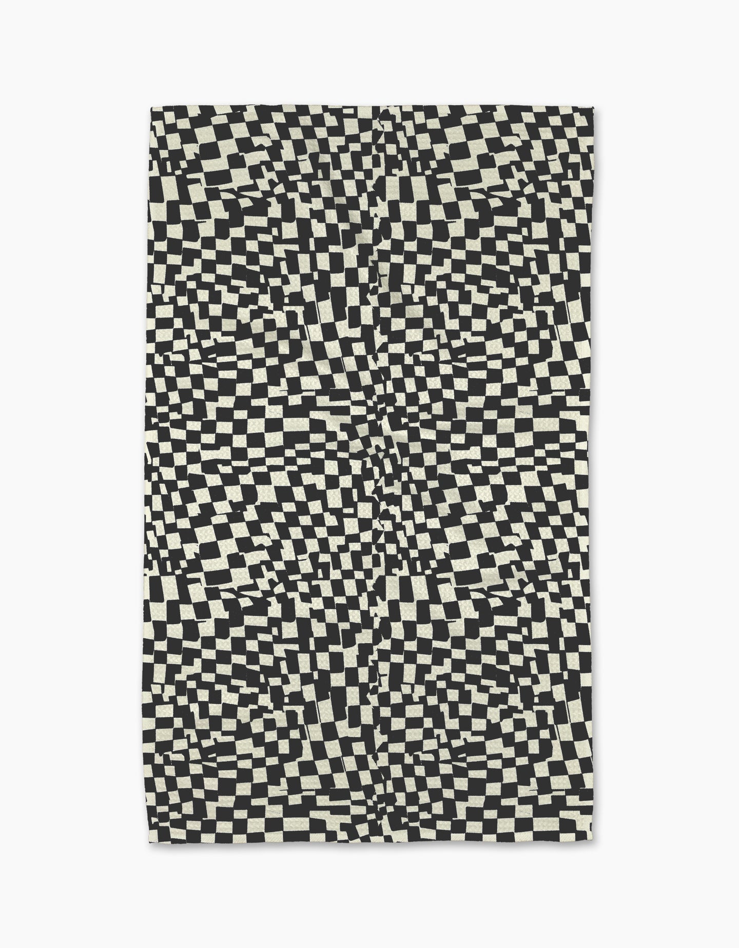 The Static rug by Geometry features a black and white distorted checkerboard pattern for an optical illusion effect—pair it with a modern, eco-friendly kitchen towel for a coordinated look.