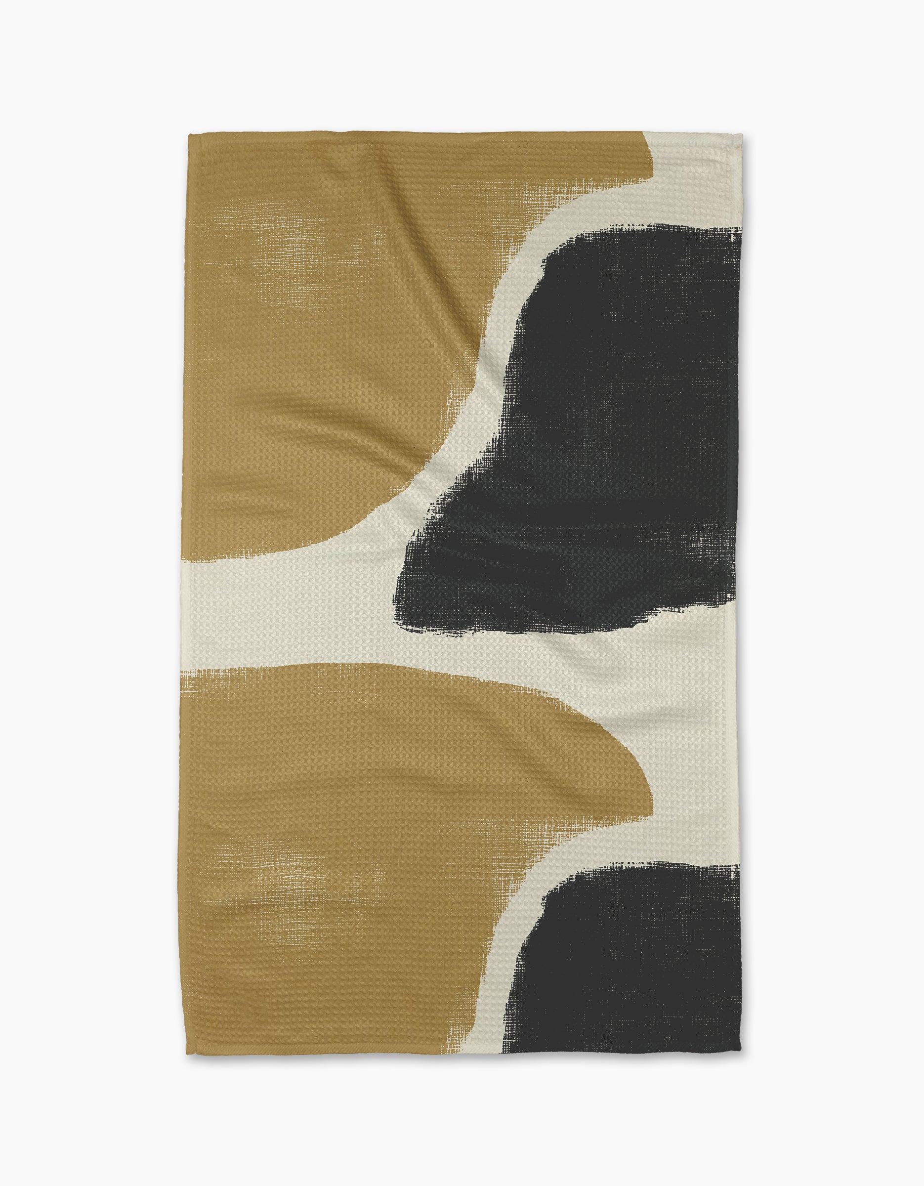 The Terzo blanket by Geometry features an abstract design with large curved shapes in mustard yellow, black, and cream on textured fabric. Made from recycled materials, it has clean edges and a painted pattern for an artistic look.