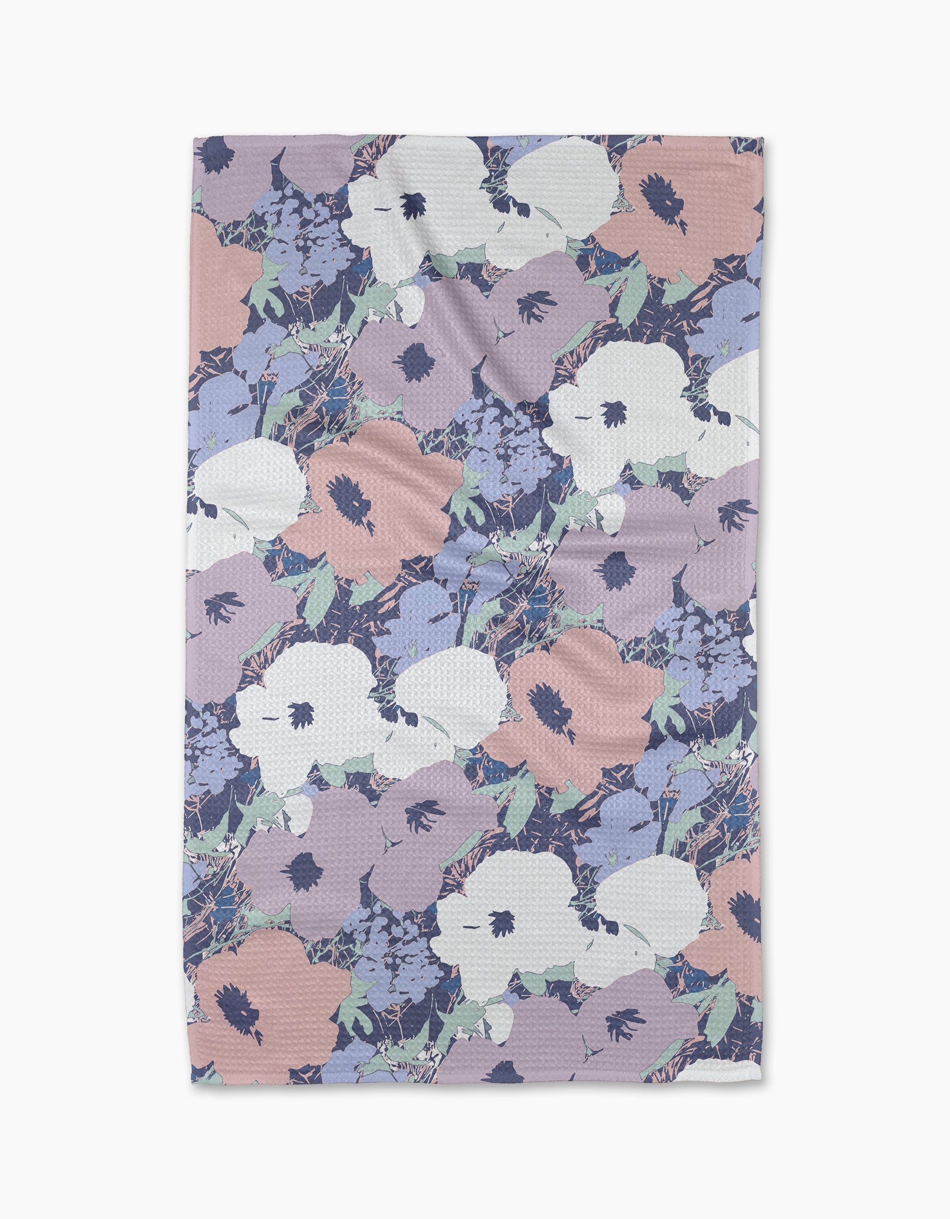 The Geometry Viola tea towel features a pastel floral design with large white, pink, and lavender flowers on a light background. Made from quick-drying, recycled materials for convenience and sustainability.