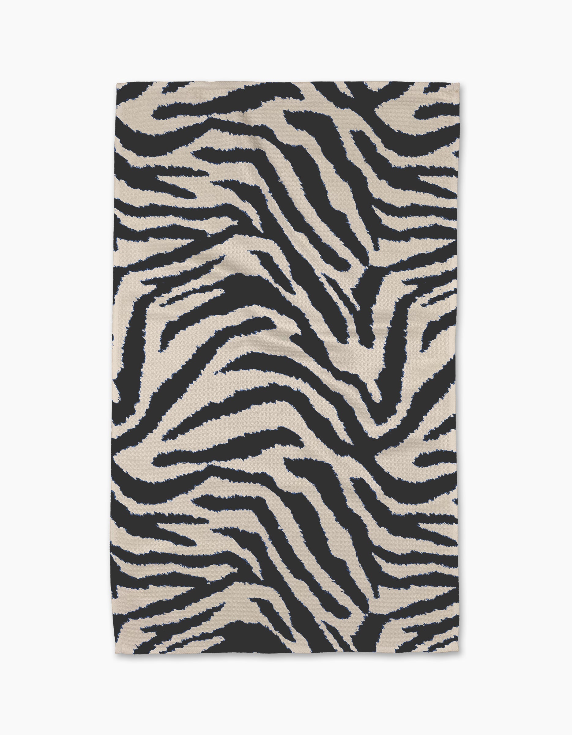 The Geometry Zira Black rug is a rectangular piece featuring bold black and white zebra stripes, crafted from recycled materials and displayed flat against a white background.