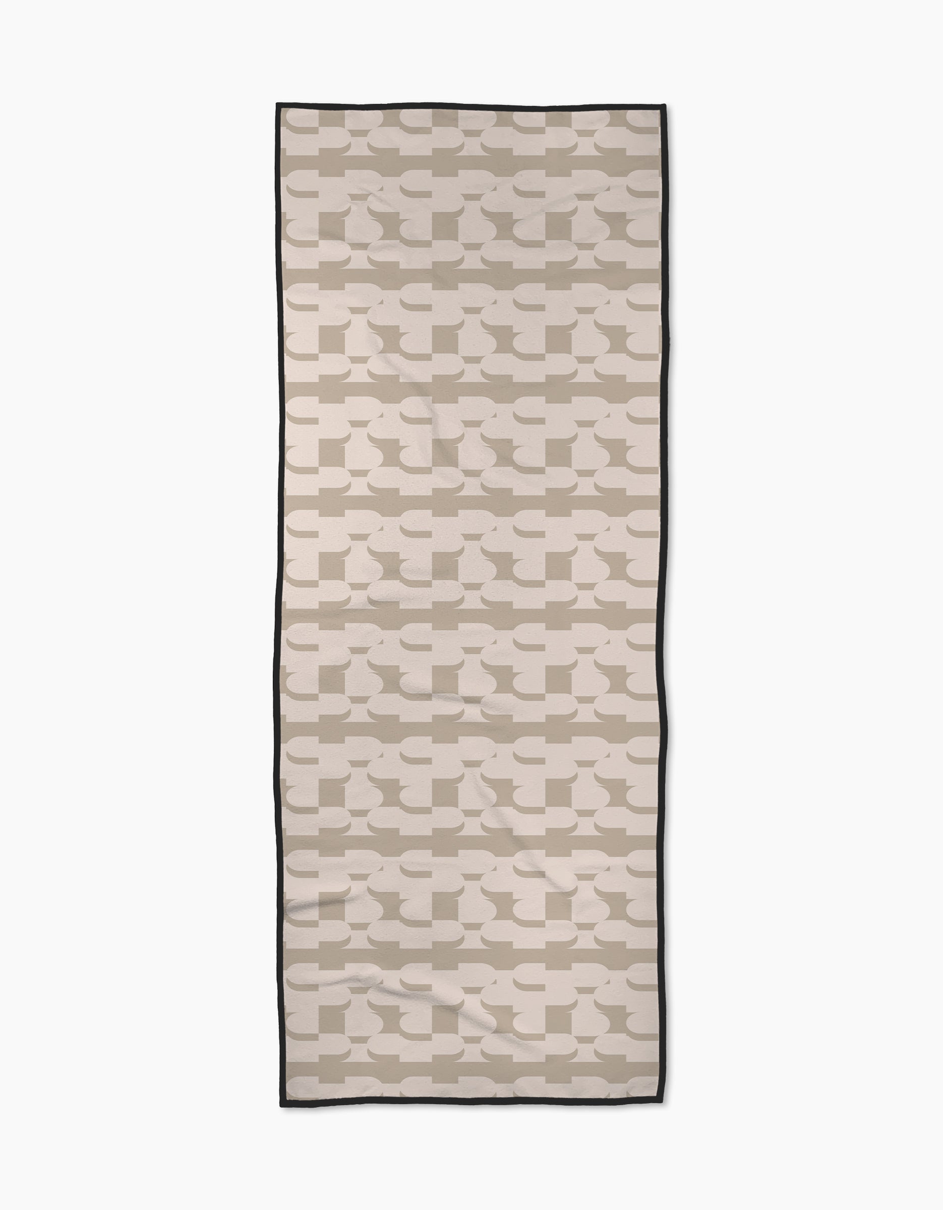 Buttons by Geometry is a rectangular yoga towel with an overlapping beige and taupe geometric pattern on cream, bordered by a thin black edge. Made from recycled materials for an eco-friendly and mindful practice.