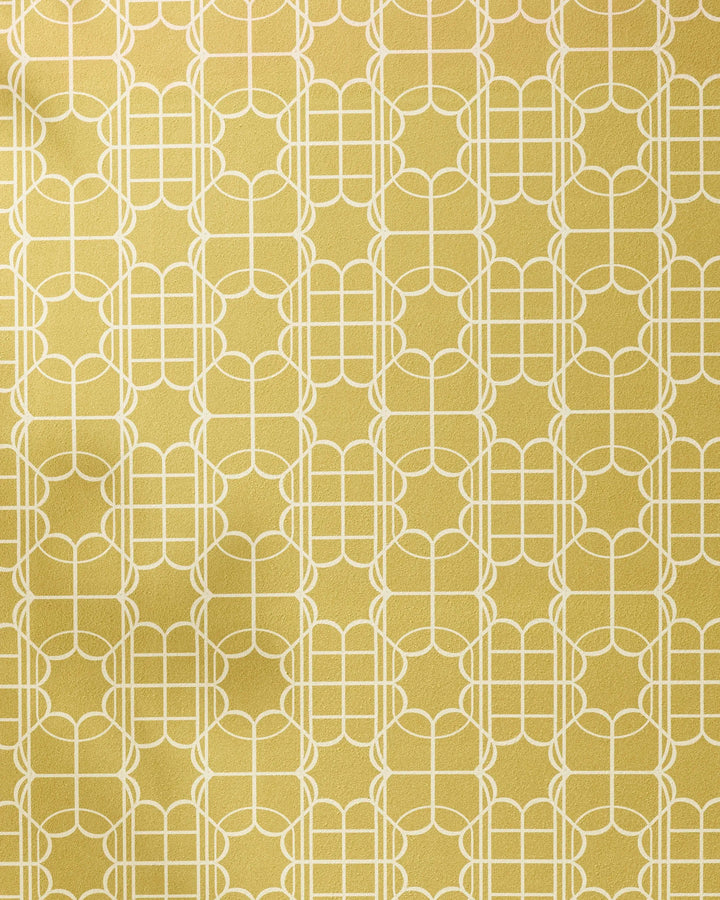 The Ferran by Geometry features a geometric pattern with cream lines forming symmetrical shapes on a light yellow backdrop—a stylish, abstract design that’s perfect for a recycled yoga towel blending style and sustainability.
