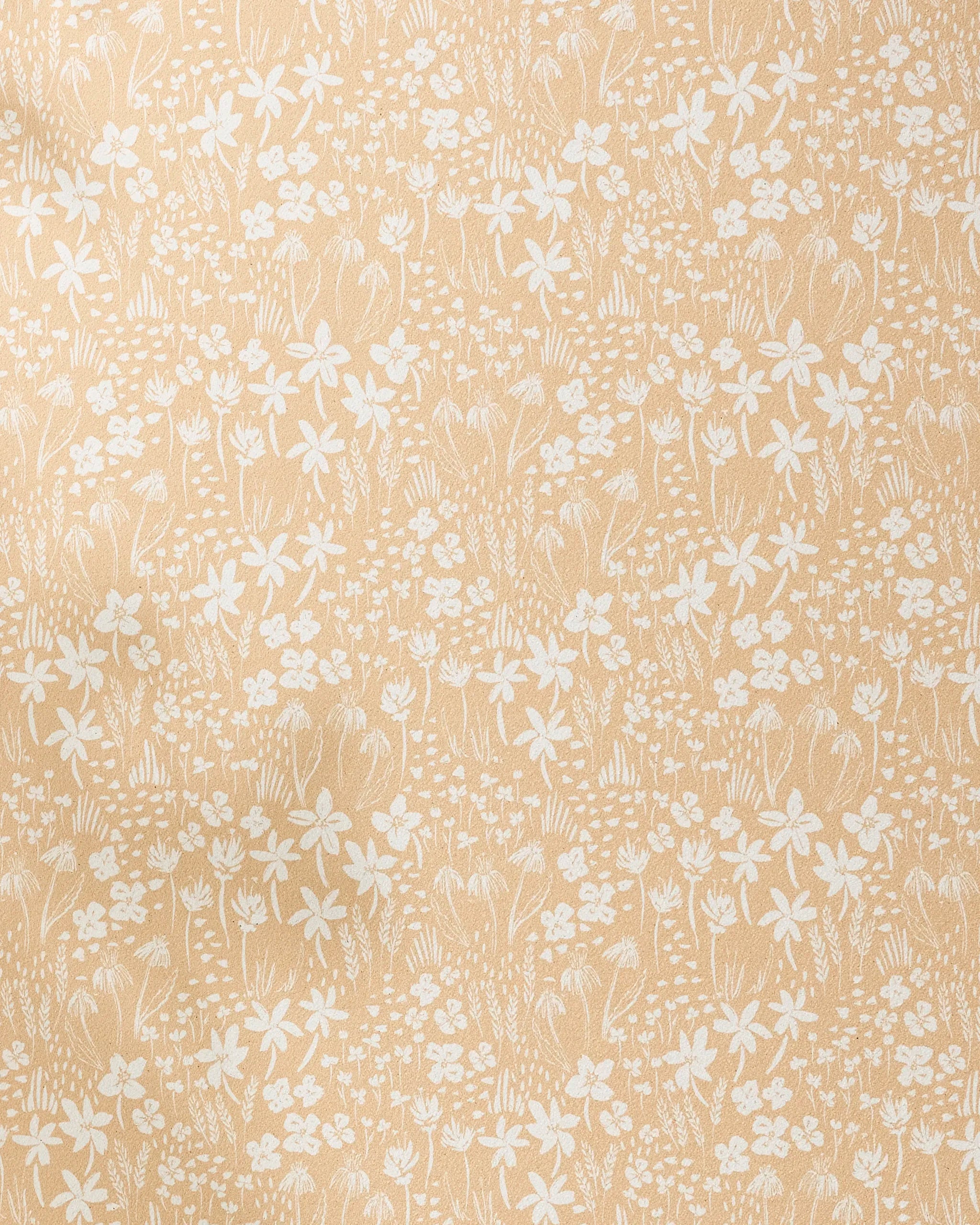 Floating Meadow by Hufton Studio features a beige background with delicate white floral patterns—small flowers, leaves, and stems—which create a vintage-inspired look. This non-slip yoga towel blends style and function for your practice.