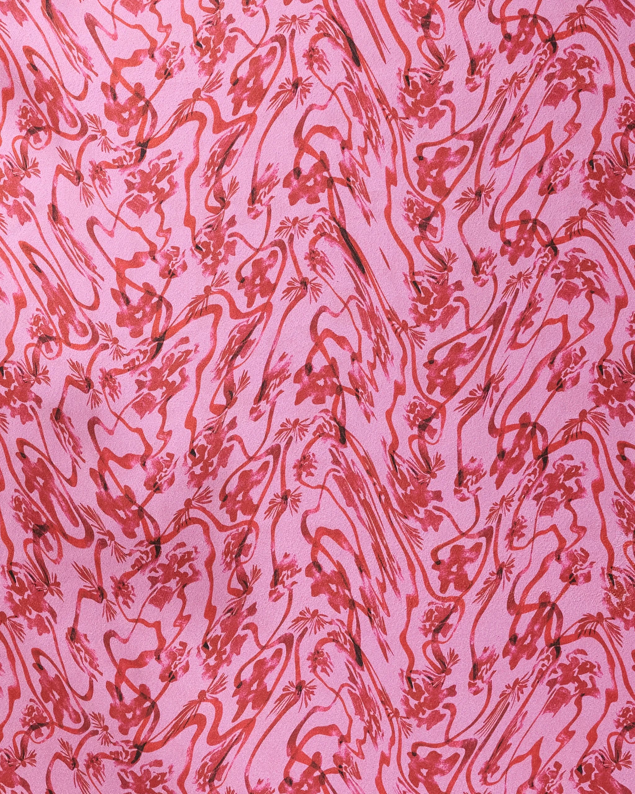 The Geometry Floral Swirls Pink yoga towel features an abstract red floral and wavy line design on pink fabric, creating a dynamic look and providing a non-slip surface perfect for your daily yoga practice.