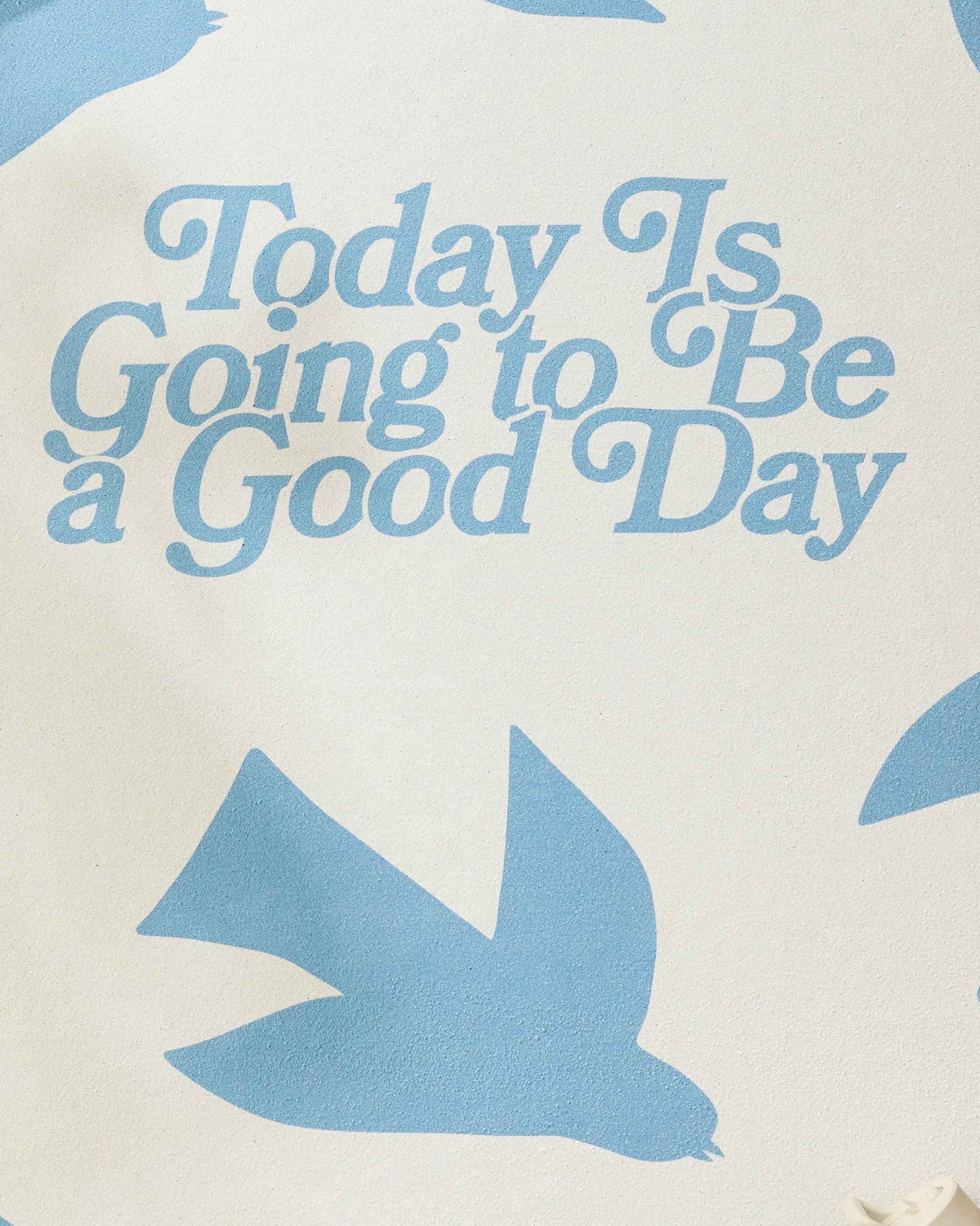 Blue text on white reads "Today Is Going to Be a Good Day," accented with bluebird silhouettes—a calming pattern from Quotes by Christie. The Good Day design is perfect for your recycled yoga mat towel or non-slip yoga towel.