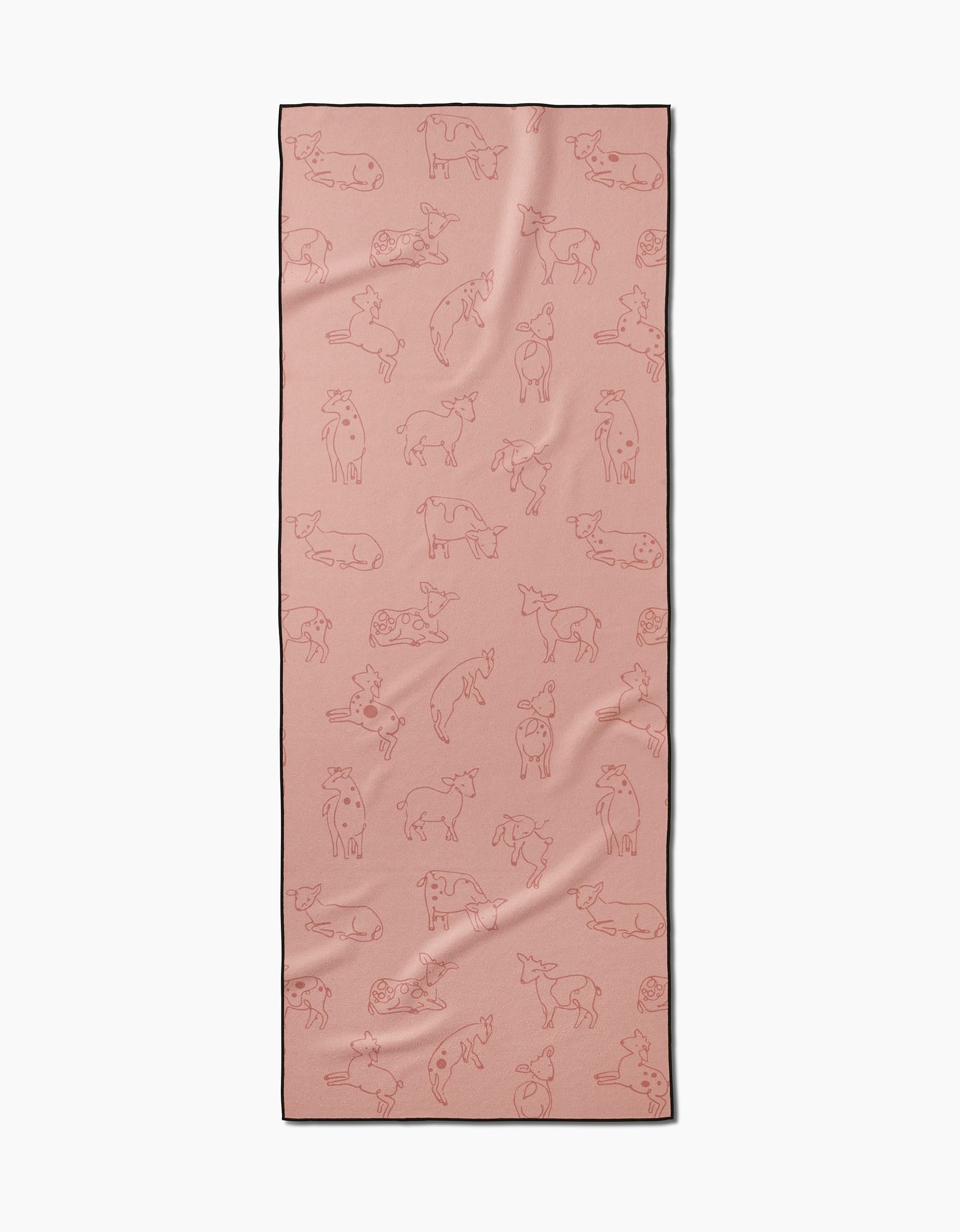 The Sara Mari Kidding Around yoga towel is a rectangular pink recycled towel with outlined dog illustrations in different poses printed across its slip-resistant surface.