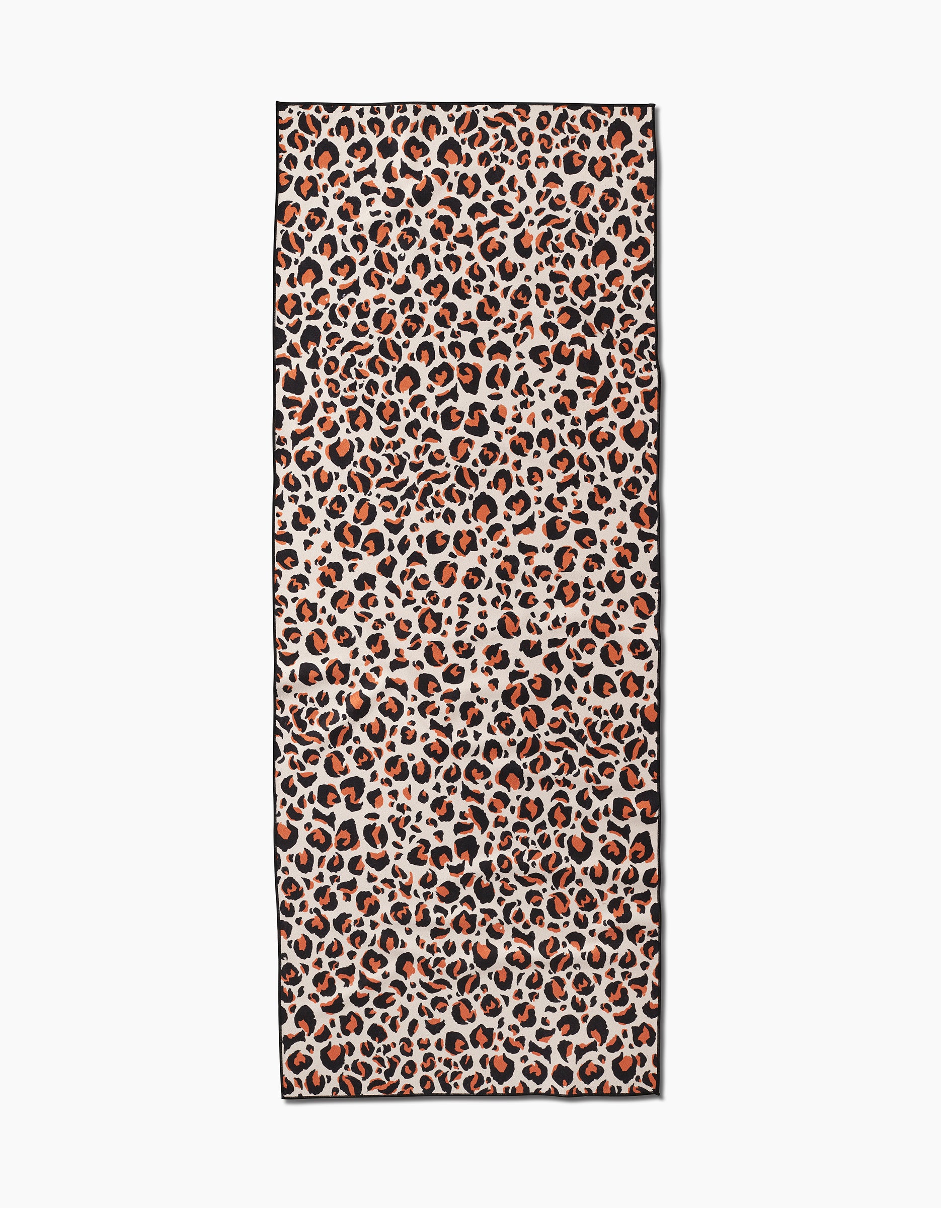 The GEOMETRY Leopard is a rectangular scarf featuring a brown, black, and orange leopard print on white, crafted from recycled materials.