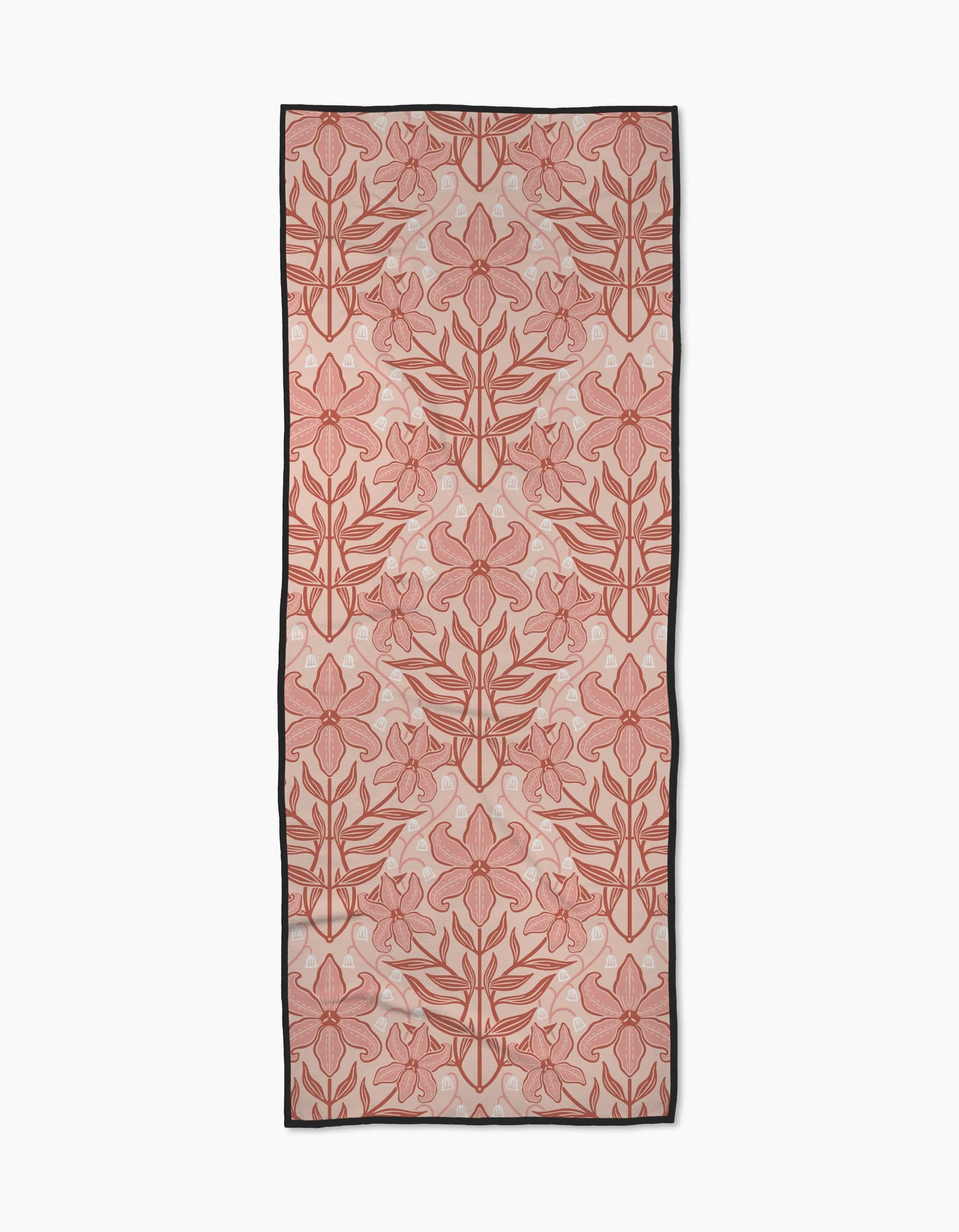 The Lily Nouveau yoga towel by Sarah Daugherty features a recycled, rectangular design with large pink and red floral patterns outlined in red, subtle dot accents on a light background, and a black border.