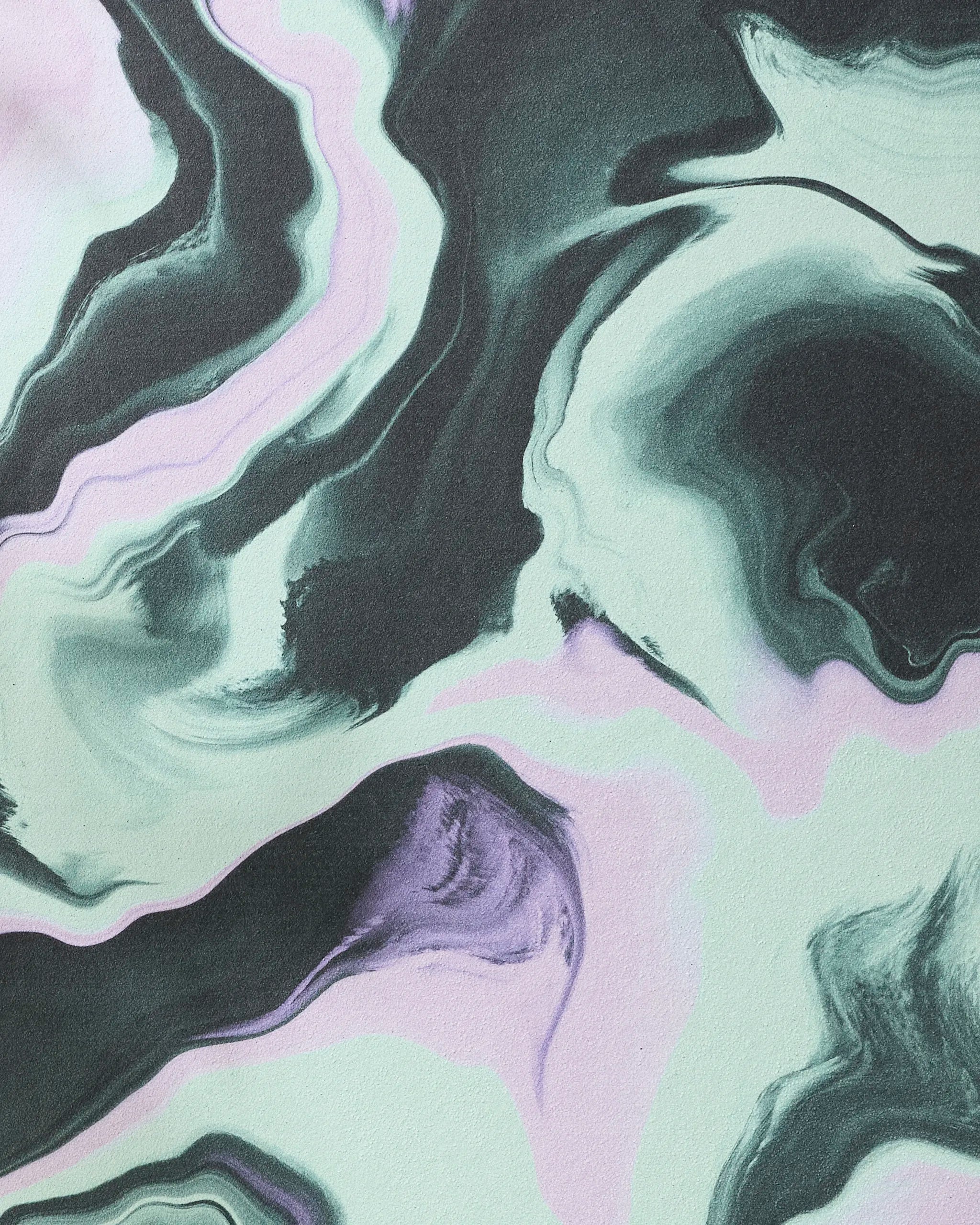 Swirling black, white, and lavender patterns create a marble effect on the GEOMETRY Marble yoga towel, blending smooth colors for a calming, elegant vibe inspired by liquid art and premium recycled materials.