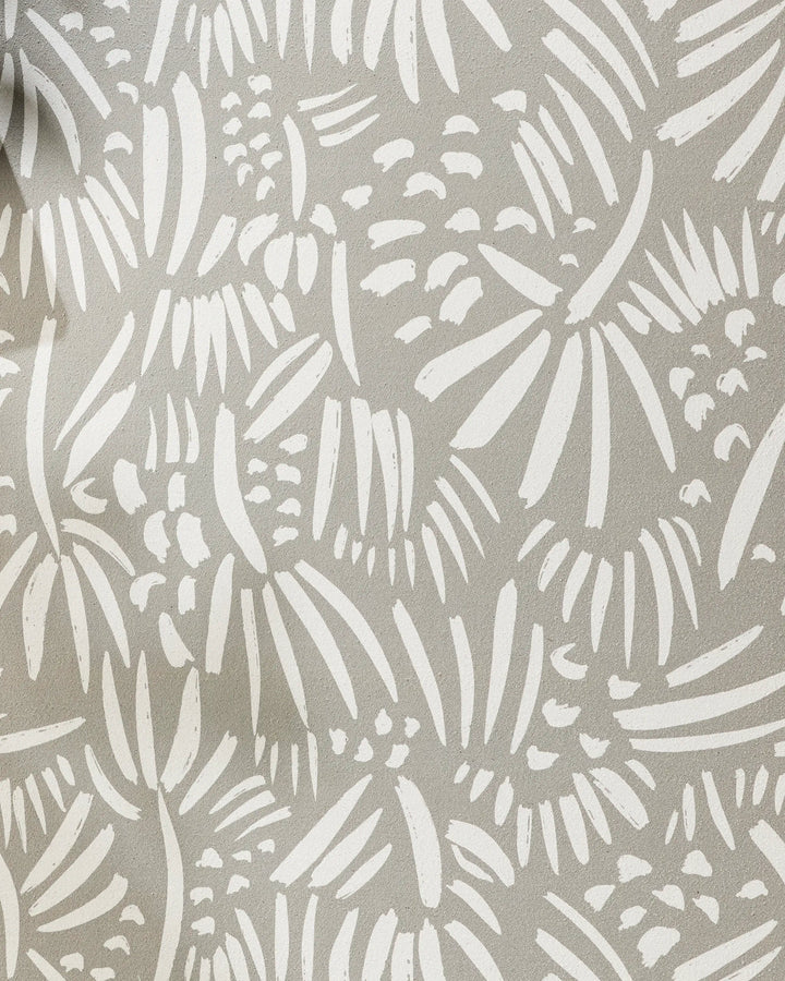The Miami yoga towel by Hufton Studio features an abstract pattern of white brushstrokes on light gray, evoking scattered leaves or petals—adding texture and style to this recycled, non-slip yoga towel.