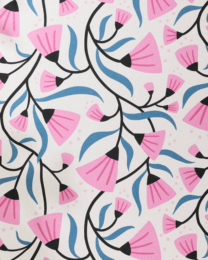 Petal Symphony" by Anette Heiberg features a seamless pattern of pink flowers, blue leaves, and black stems on white with pink dots—ideal for a vibrant recycled or non-slip yoga towel.