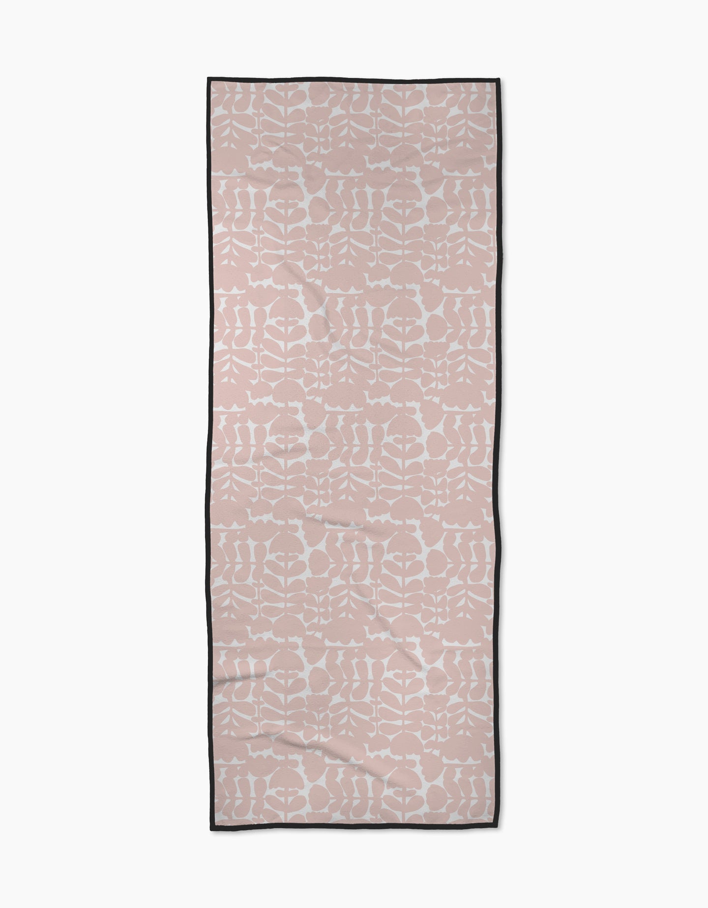 The Pink Scandi Flowers yoga towel by Katie OShea is rectangular, light pink with a white symmetrical floral pattern and a thin black border, shown flat on a white background.