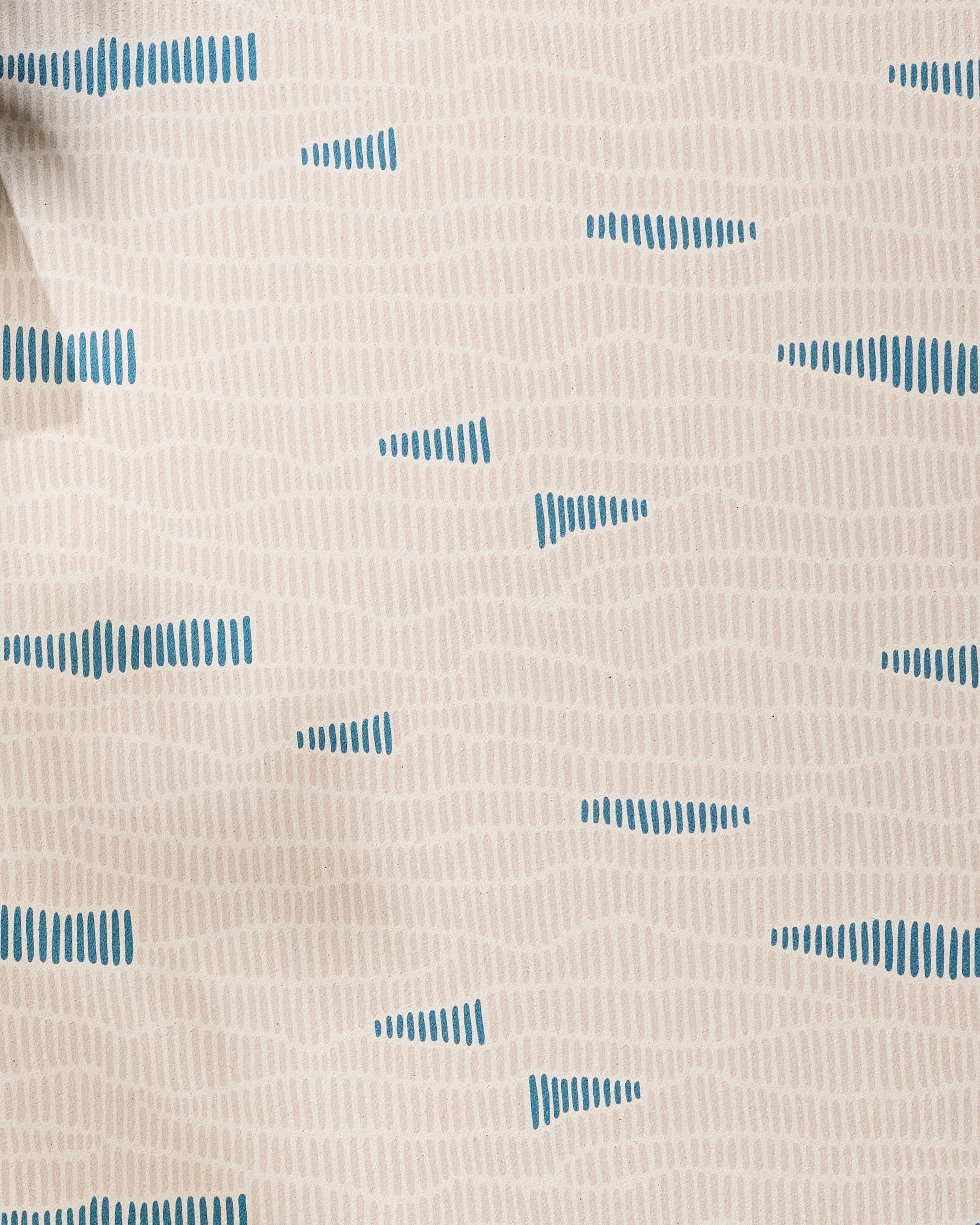 Ridgeline by Twig + Spark features beige fabric with wavy tan lines and spaced blue accents, creating a modern geometric style—perfect for a non-slip yoga towel that blends style and function.
