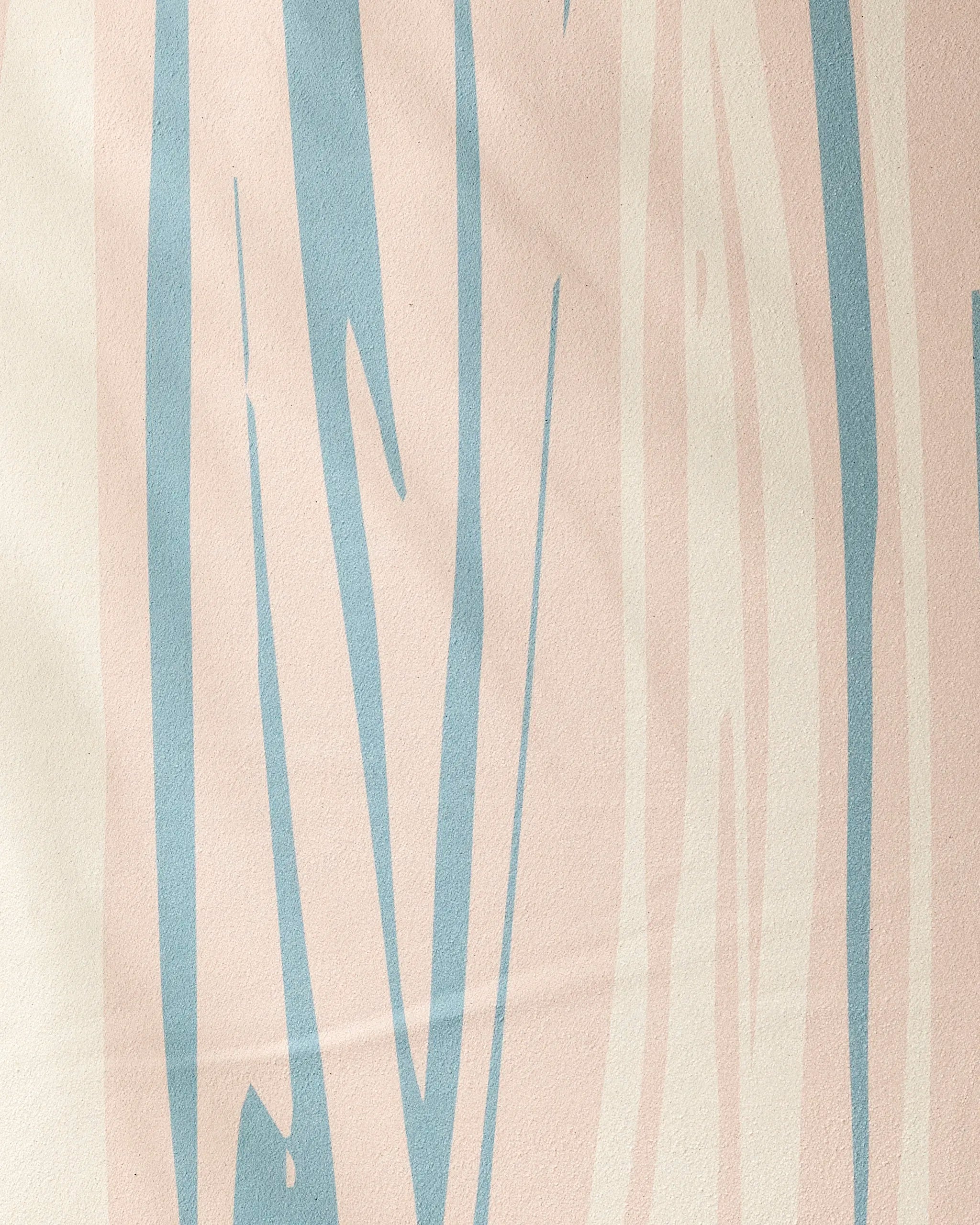 The GEOMETRY Root yoga towel showcases an abstract pattern with pale pink and light blue wavy vertical lines on a creamy off-white background, combining style and non-slip function for your yoga practice.