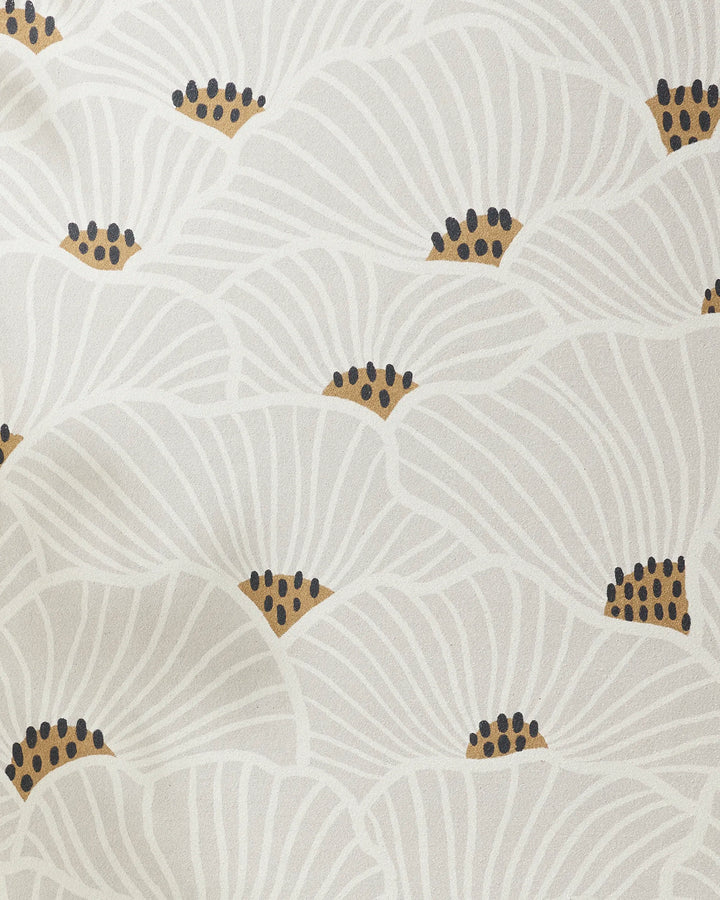 San Diego by Amy MacCready features overlapping white flowers with gold centers and black dots on a light background. Flowing, curved lines outline each petal—ideal for adding flair and function to your yoga towel or recycled yoga towel.