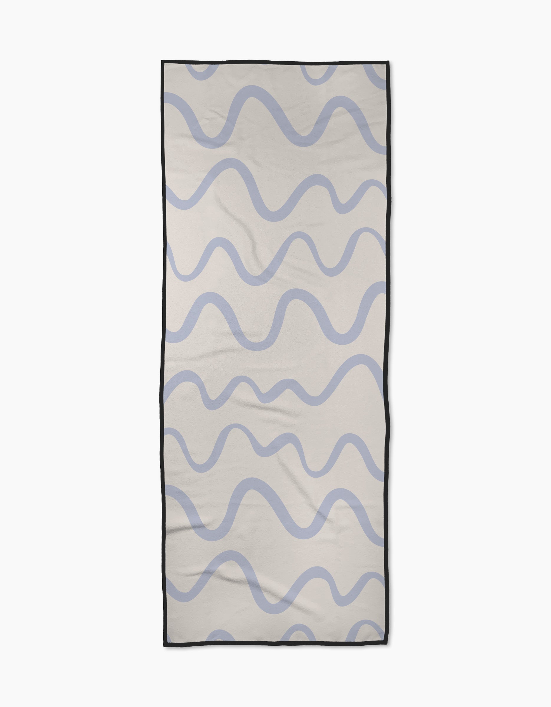 The Wavy Stripe in Blue yoga towel by Teri the Butter is a rectangular, recycled towel featuring wavy blue lines on a light beige background with a thin black border.