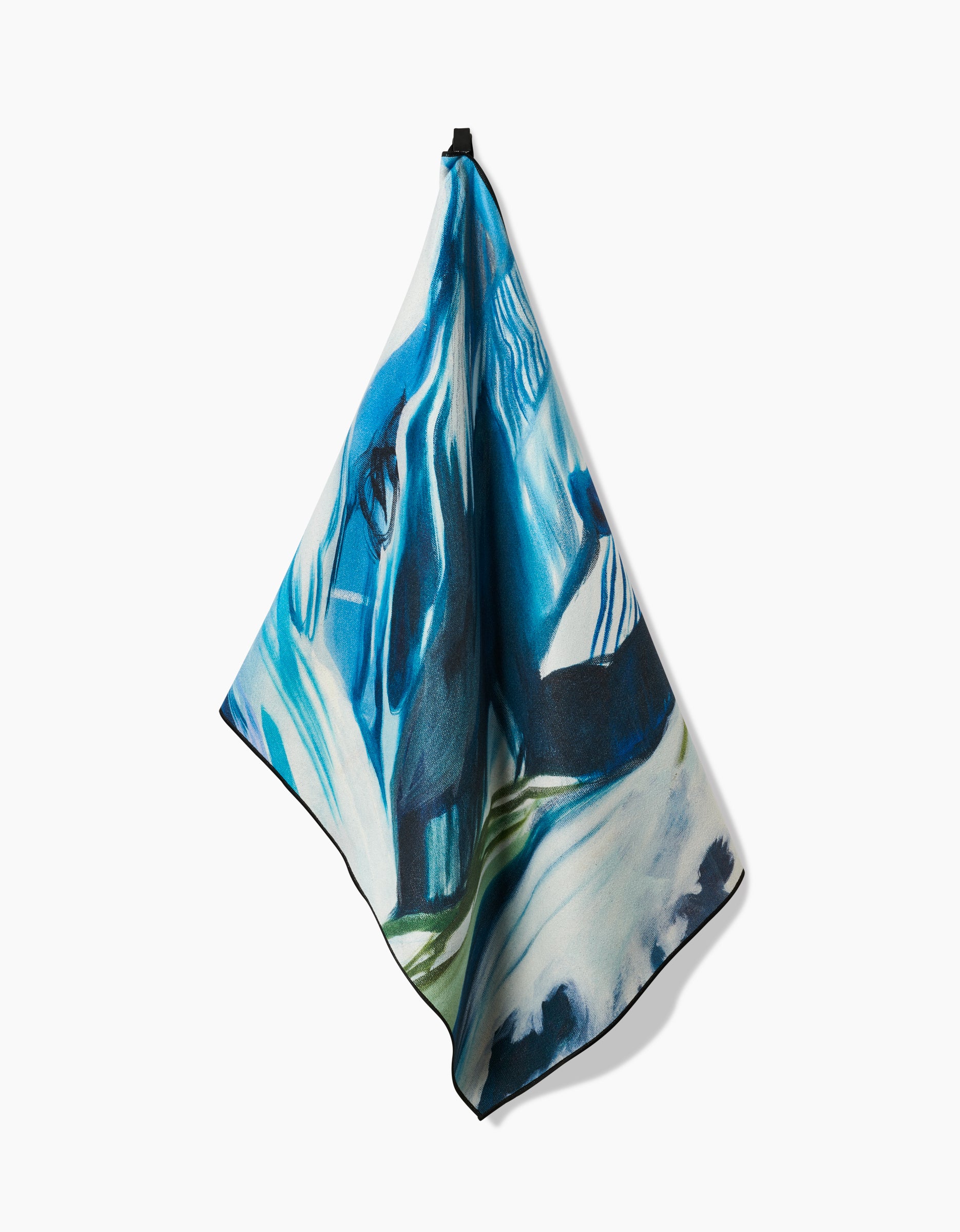 The Where He Laid To Go square yoga towel by Kelly Peters, made from recycled materials and displaying abstract blue, white, black, and green patterns, is shown hanging from a single point against a plain white background.