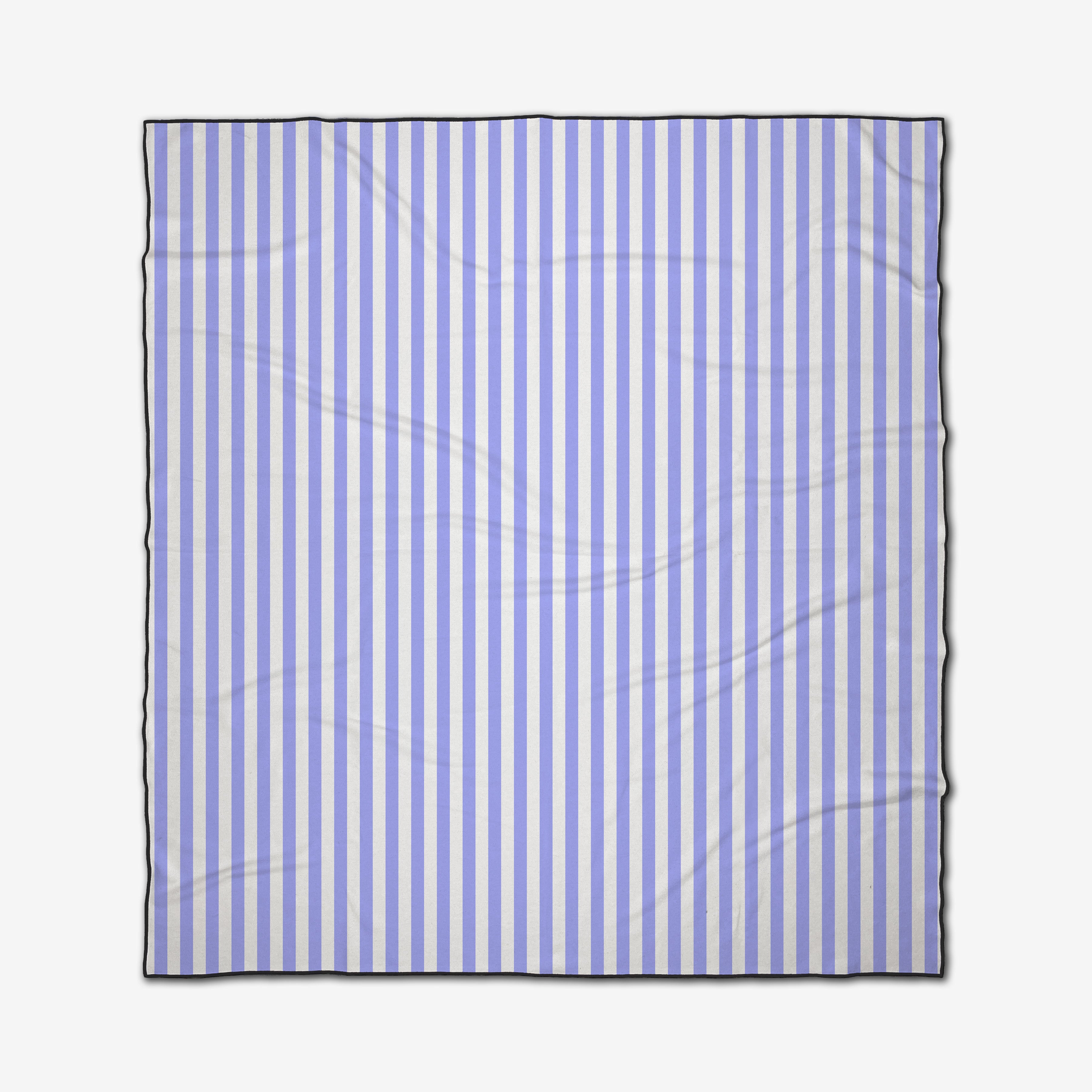 The GEOMETRY Light Blue Stripes micro-loop beach blanket is square, made from recycled materials, features evenly spaced vertical blue and white stripes, slight wrinkles, a thin dark border, and is shown on a plain white background.