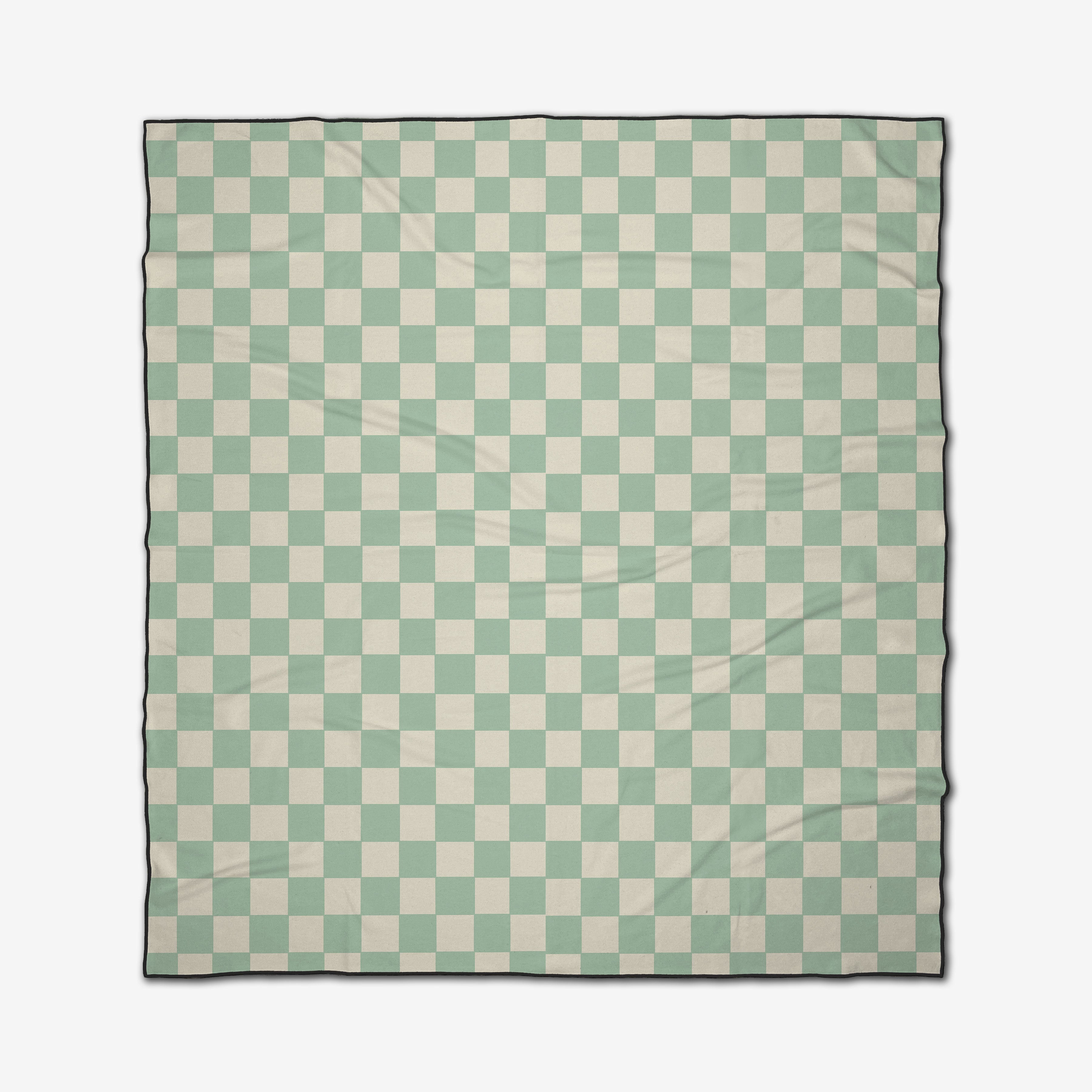The GEOMETRY Mint Checker is a quick-drying Micro-loop Beach Blanket featuring a light green and white checkered pattern with a thin black border, shown lying flat with slight surface wrinkles.