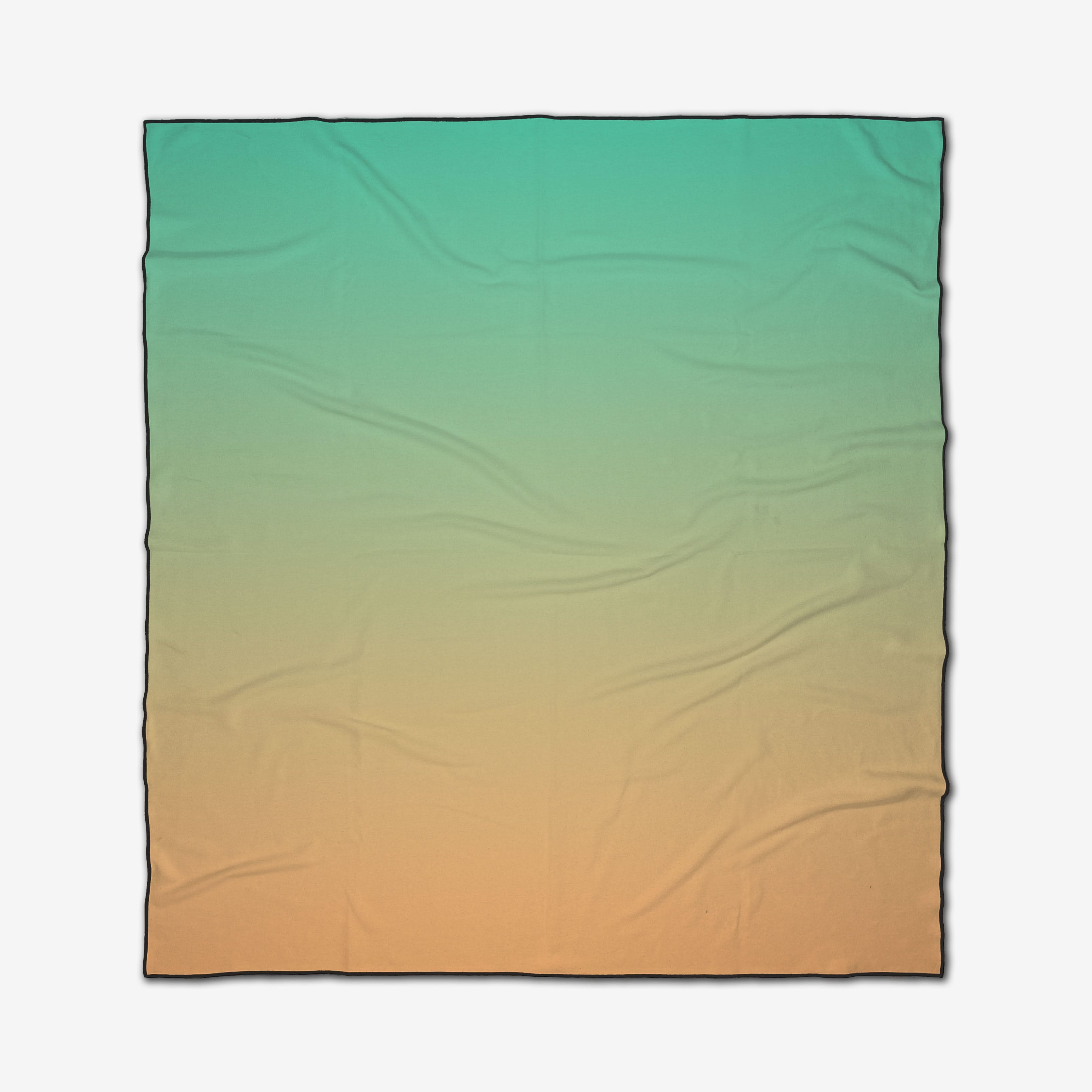 The GEOMETRY Tangerine Dream is a quick-drying beach blanket featuring a gradient design that fades from teal at the top to light orange at the bottom, displayed flat with subtle fabric wrinkles.