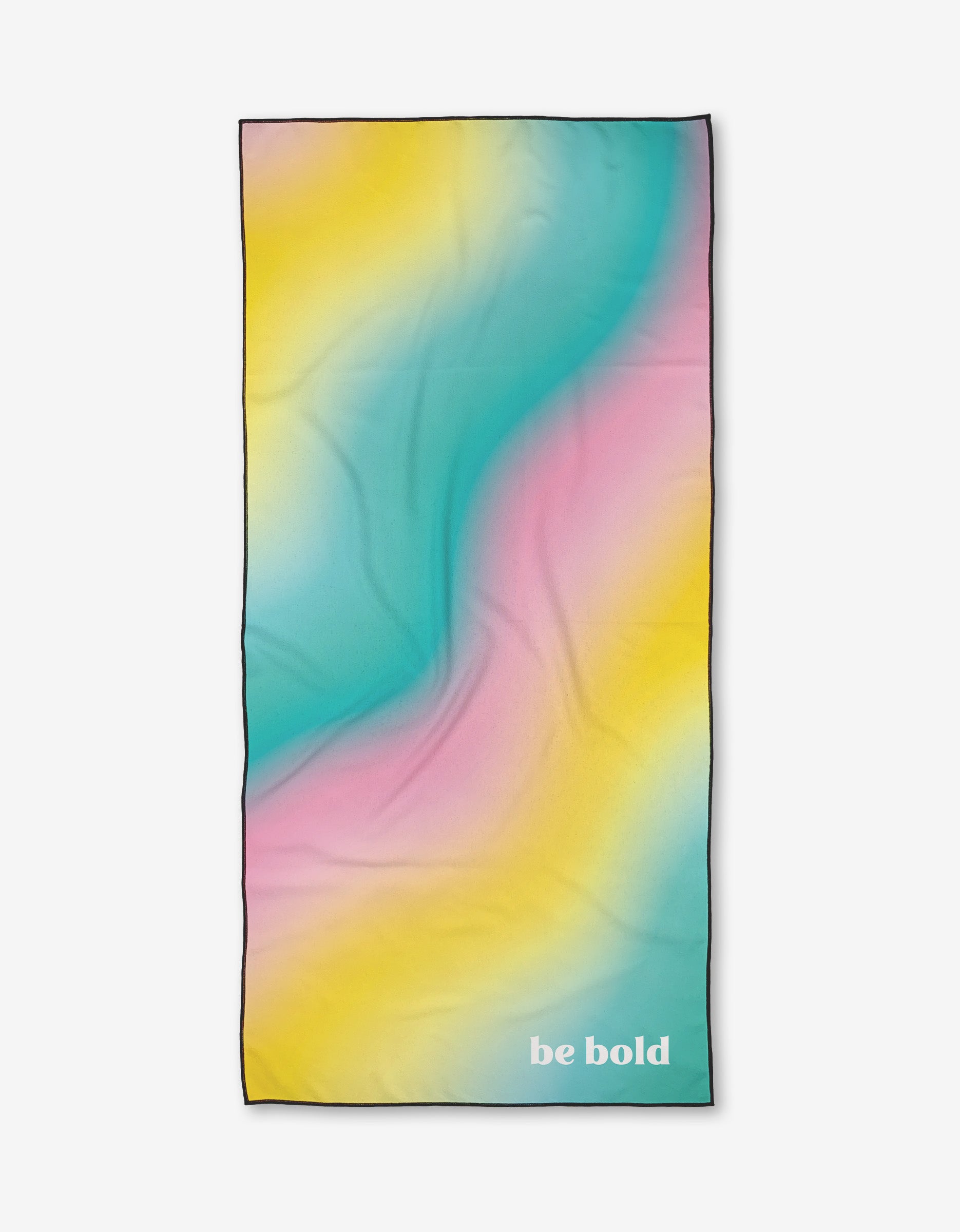 Bold by Bailey Peyton is a rectangular quick-drying beach towel with a smooth pastel gradient in yellow, blue, and pink, featuring be bold in white at the bottom right.