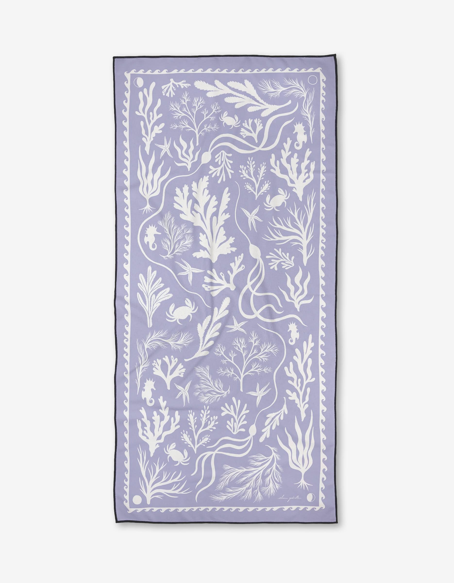 Elana Gabrielles Coastal Tides is a rectangular lavender micro-loop beach towel with white seaweed, coral, fish, crab, and seashell illustrations plus a decorative border. Quick-drying—ideal for the shore.