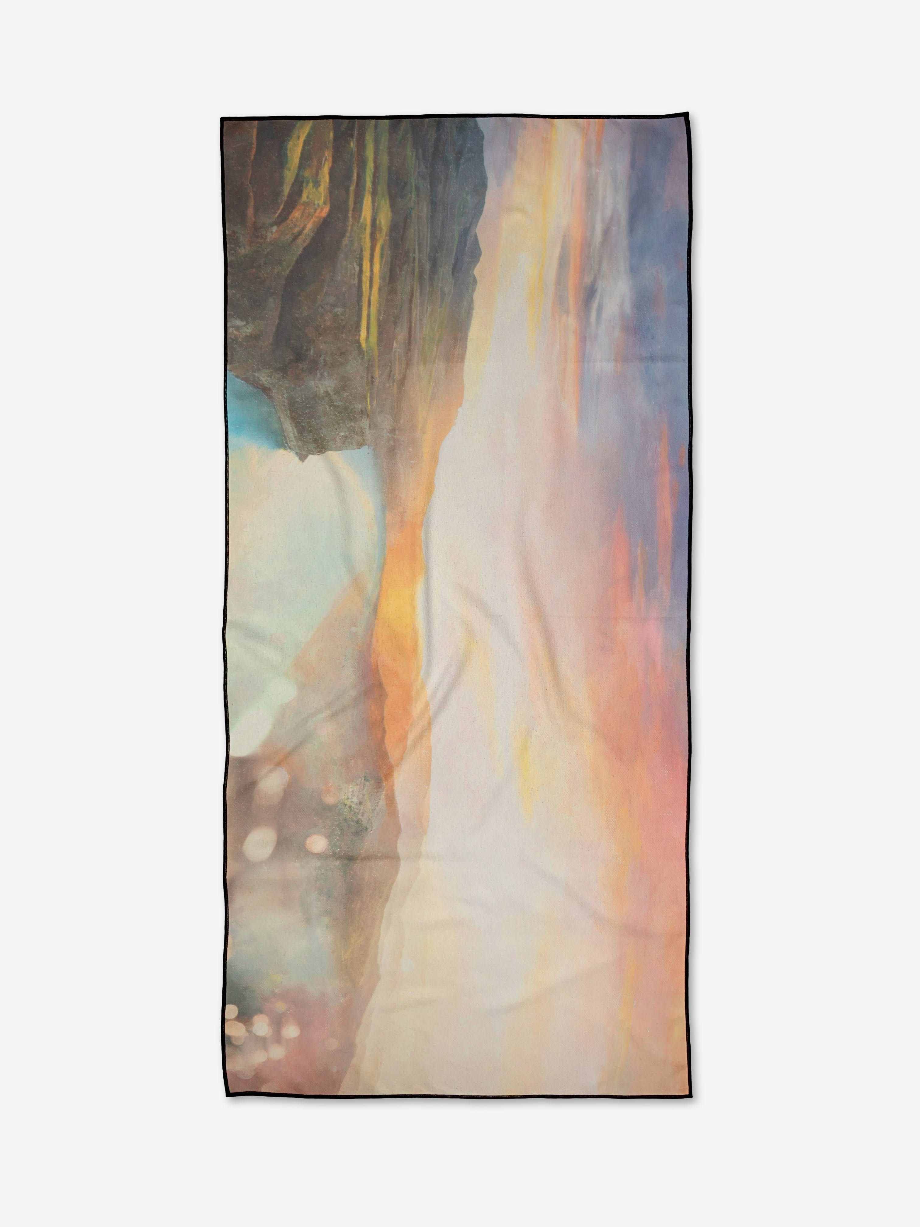 The Colors of the Earth rectangular micro-loop beach towel by Stefanie Bales features an abstract, waterfall-inspired design with softly blended orange, blue, beige, and brown tones for a smooth texture and subtle flow.