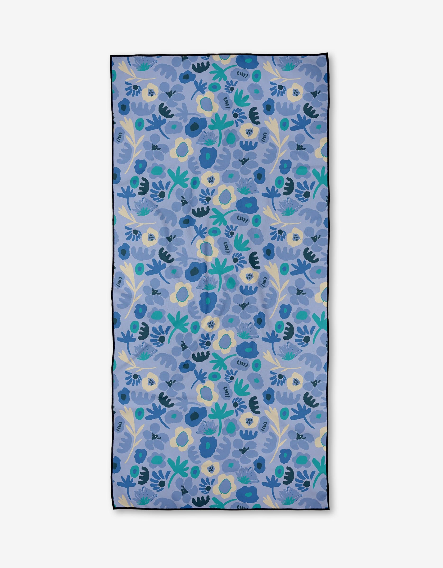 The Cool Blooms towel by Sareka Unique is rectangular and quick-drying, with a blue background and a repeating floral pattern in blue, green, yellow, and cream, all outlined with a thin dark border.