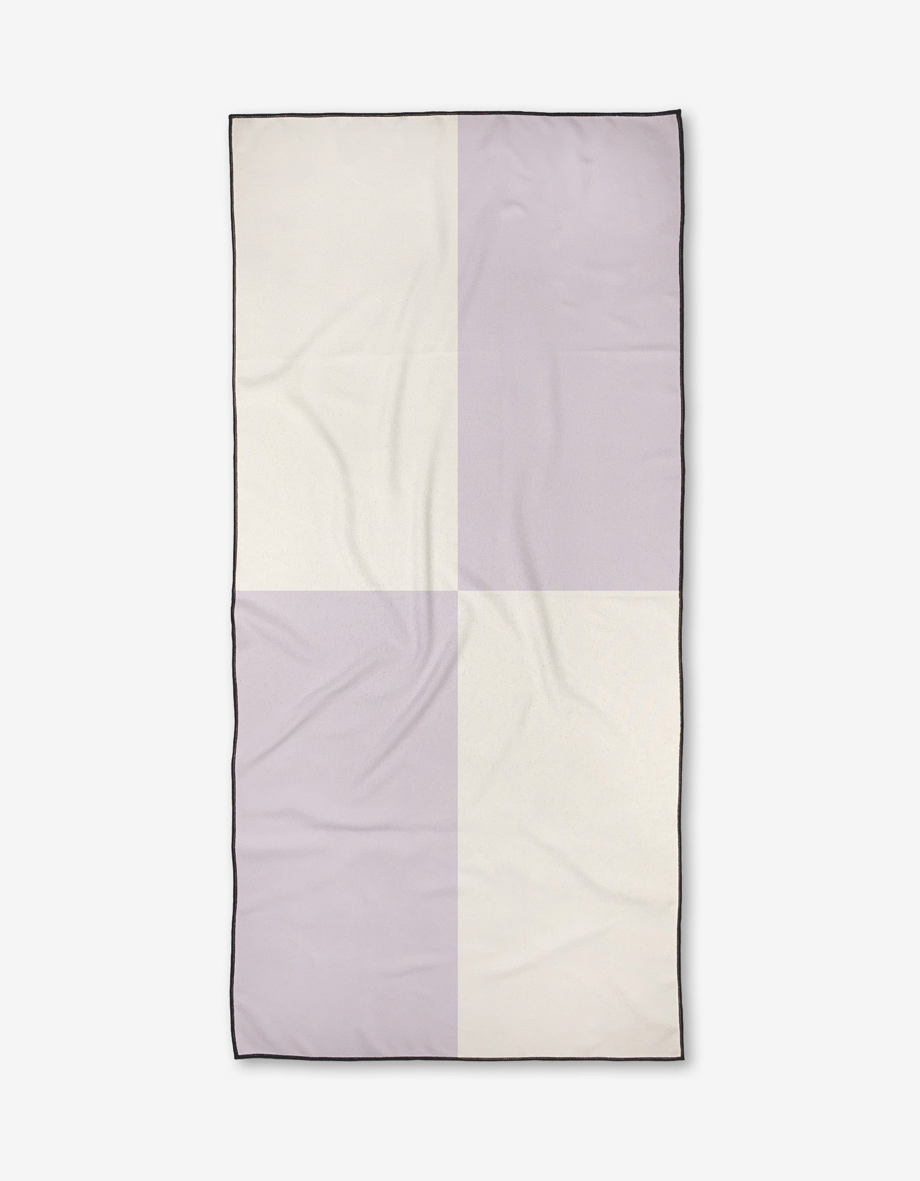 The Kelsi Fullmer Four Square is a rectangular, quick-drying Micro-loop Beach Towel in light beige and pale lavender checkerboard with a thin black edge. Made from recycled materials, it features slight wrinkles and is shown flat on white.