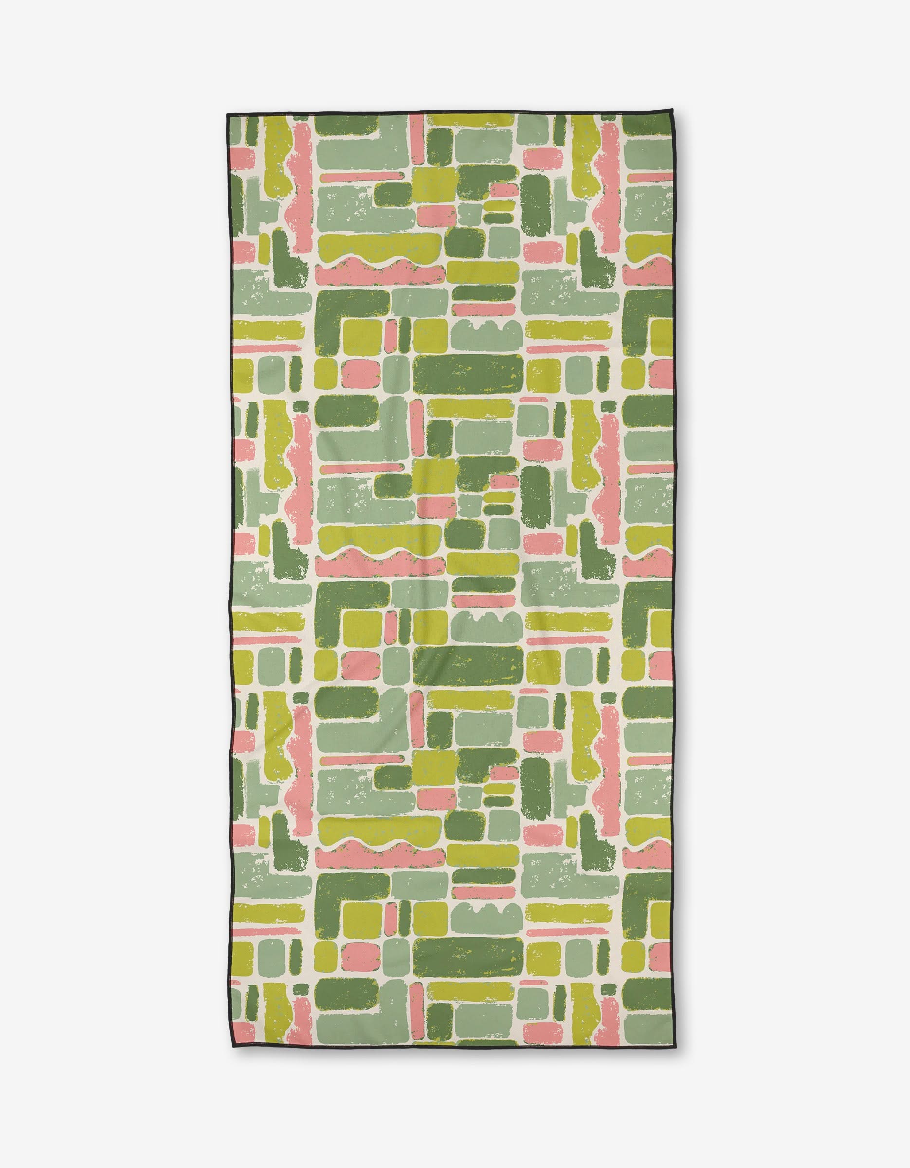 Kayla Ann Landpatch Beach Towel made from recycled materials. Rectangular towel with geometric green, yellow, and pink hand-painted shapes on white, finished with a black border.