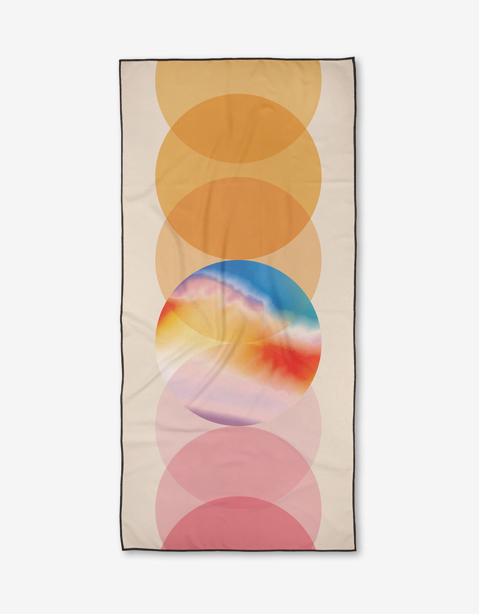 The GEOMETRY Pink Dream beach towel features a rectangular micro-loop design with six overlapping circles in yellow, orange, blue, pink, and red gradients on beige, a thin black border, and a colorful tie-dye effect in the center.