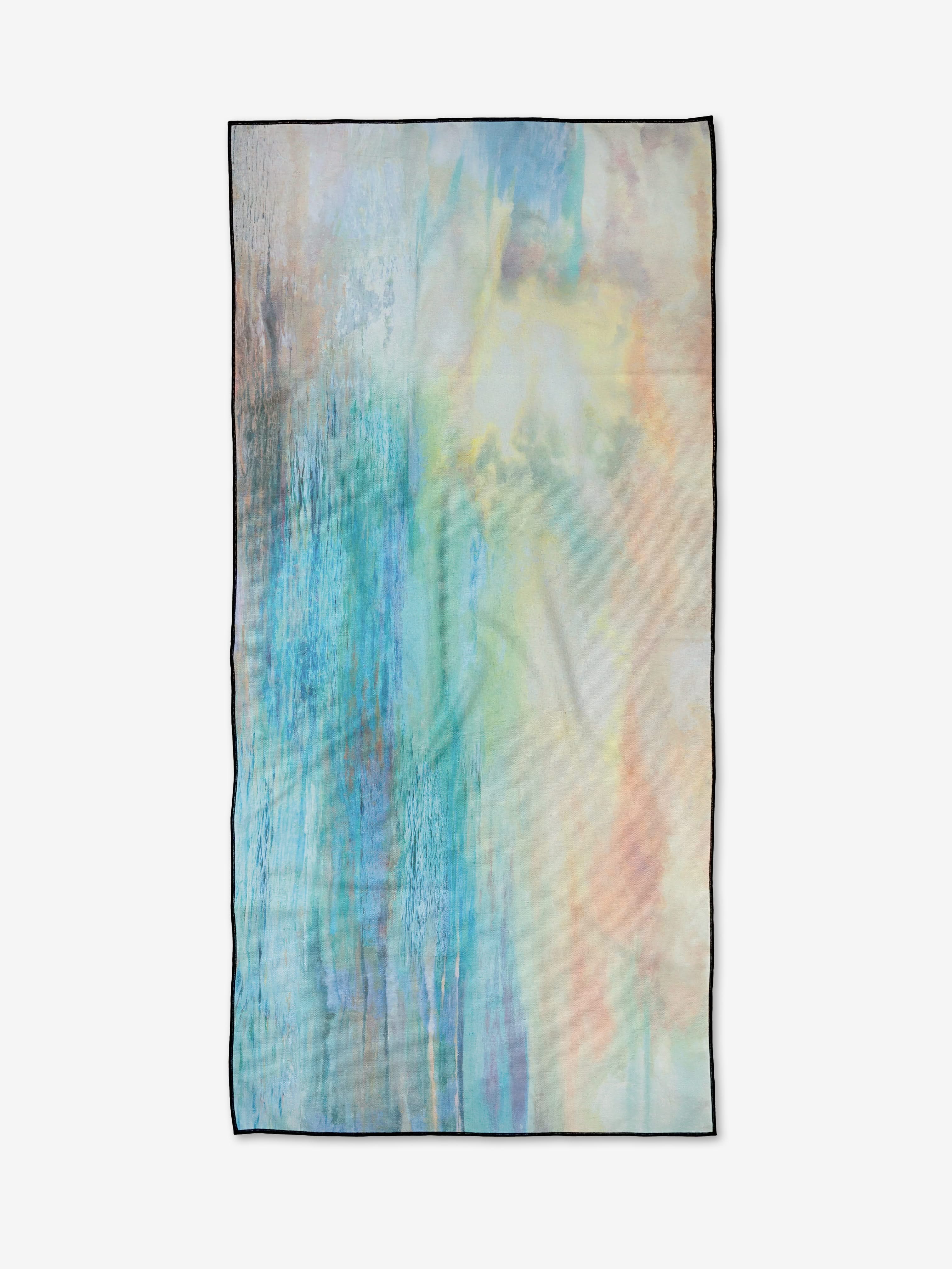 The Summer Sun beach towel by Stefanie Bales features an abstract watercolor design in blue, teal, yellow, and peach on a light background with a dark border. Made from quick-drying recycled materials for eco-friendly comfort.