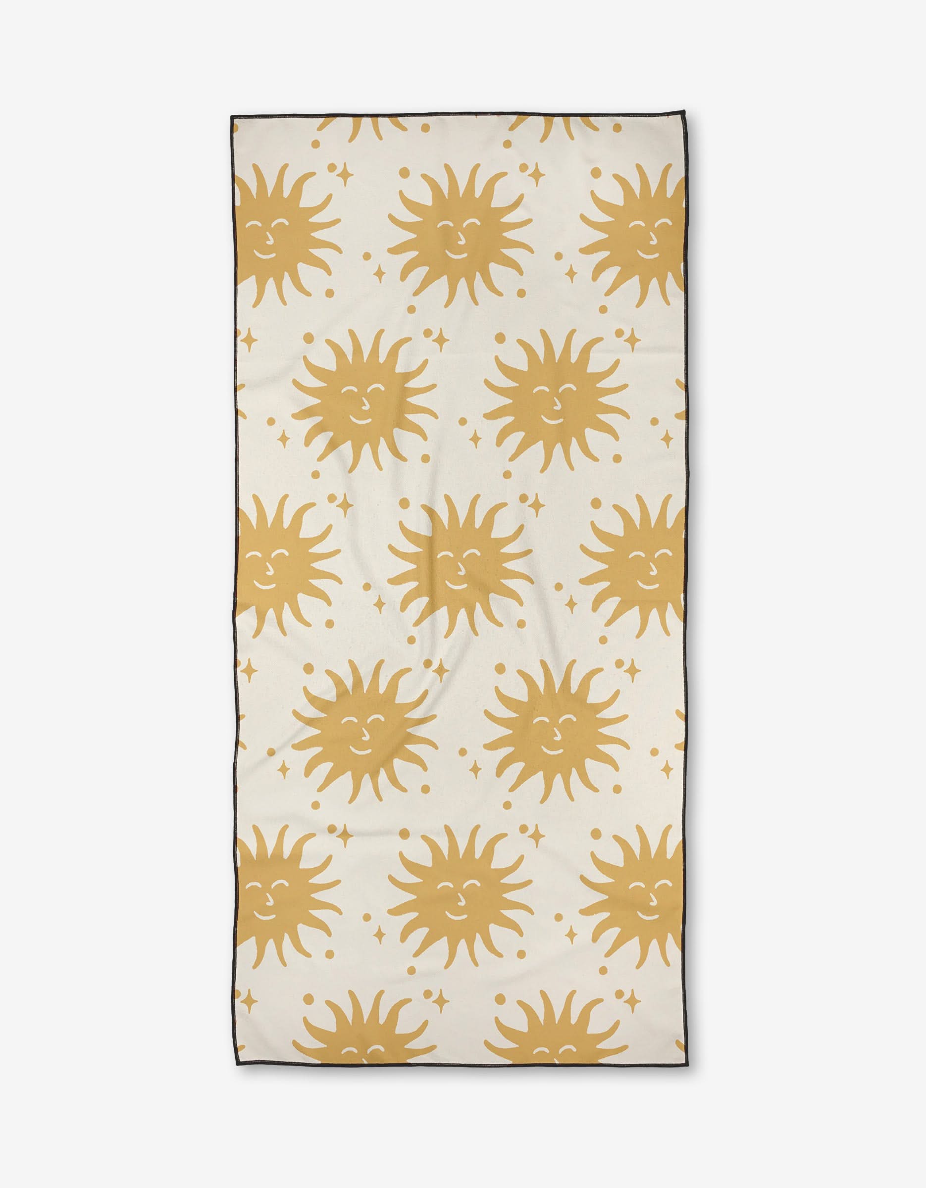 The Summer Sunshine beach towel by Graphics and Grain is a rectangular beige quick-dry towel featuring smiling golden suns, star patterns, and a slim black border.