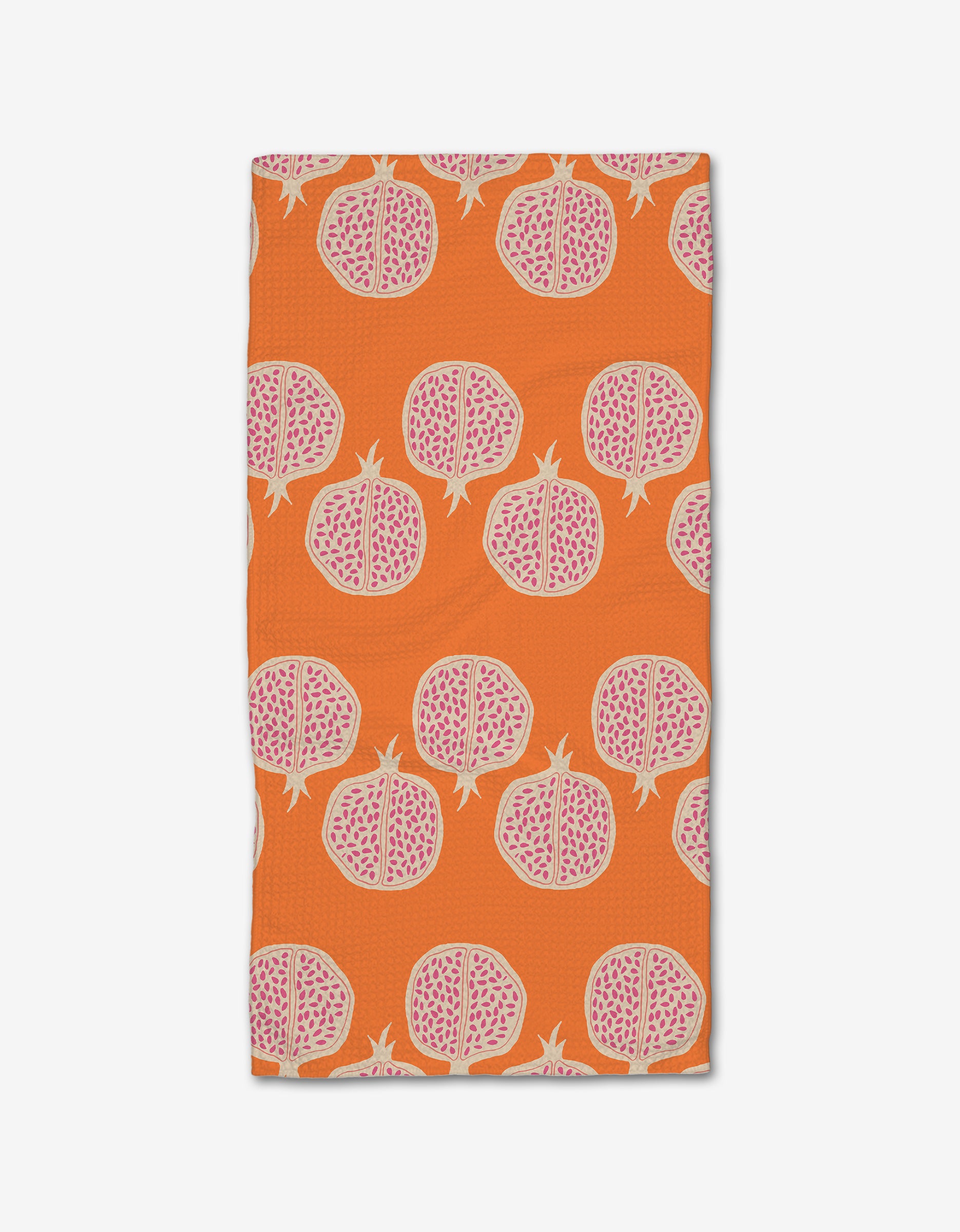The Pomegranate Parade bar towel by Lizzie Clark features a vibrant orange Geoweave fabric with a repeating motif of halved pomegranates in pink and white.