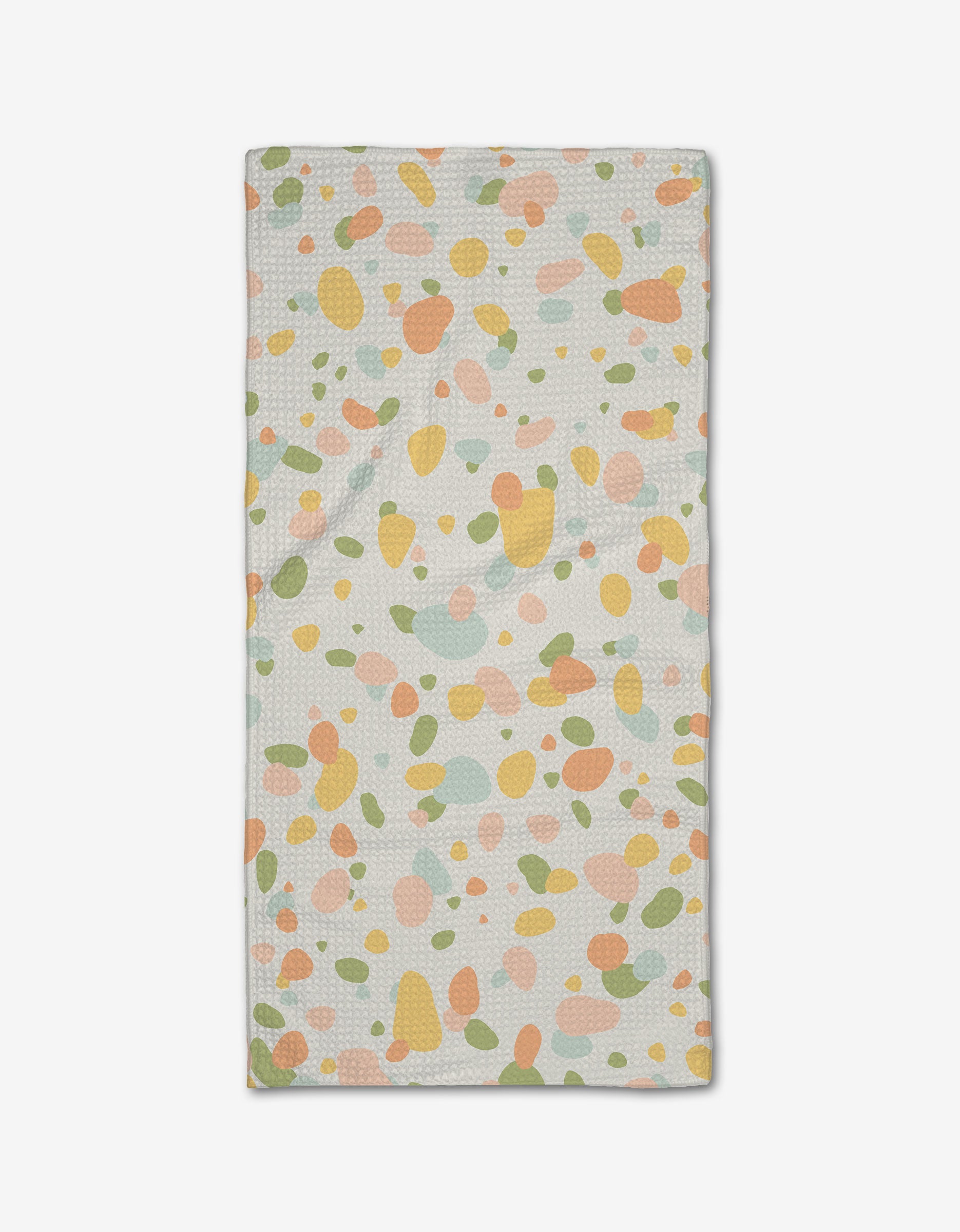 The Rainbow Freckles Bar Towel by Sweet Simple Vegan features a white background with abstract pastel spots in orange, green, yellow, and pink, and is crafted from absorbent Geoweave fabric.