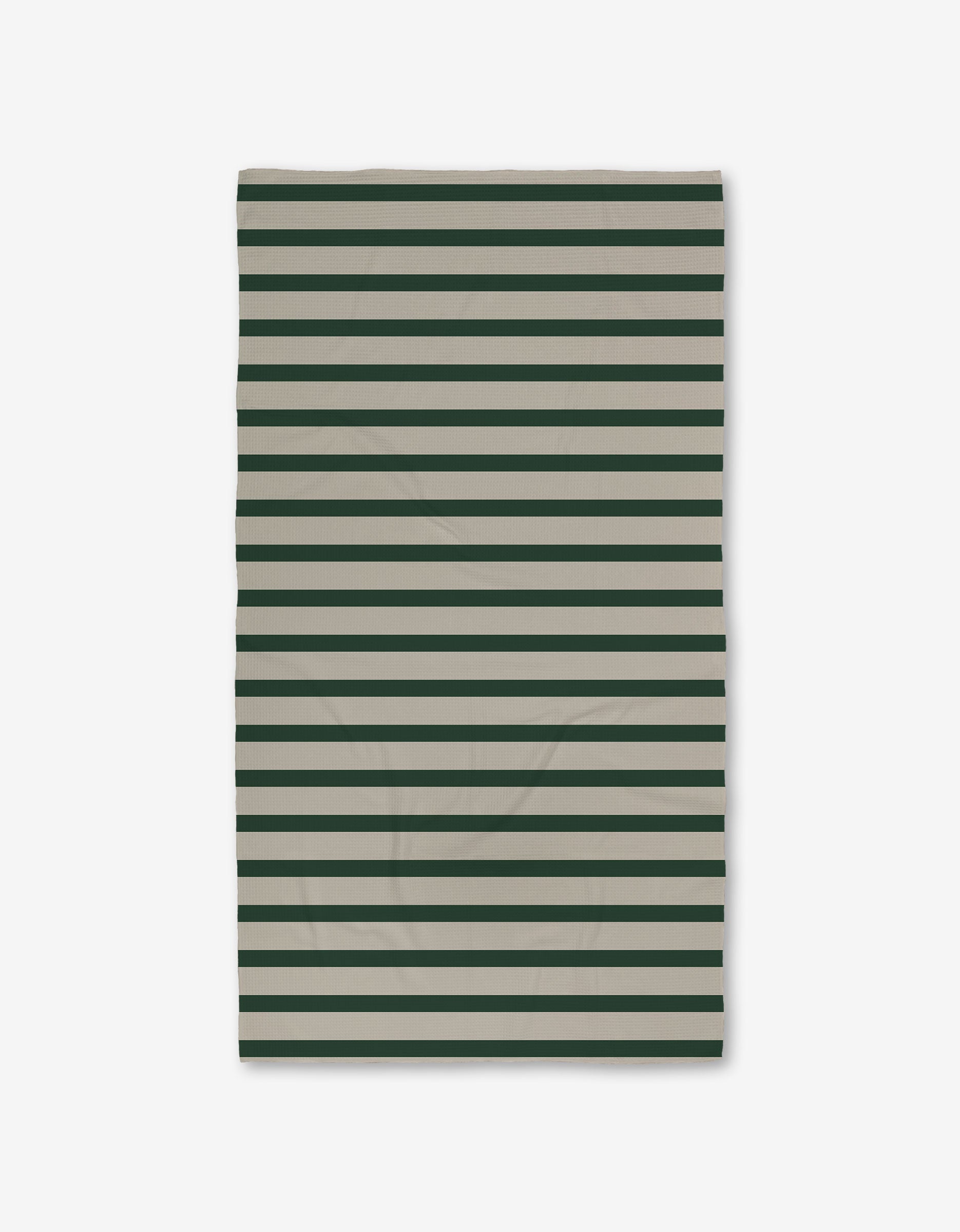 The GEOMETRY Deep Green Stripes Luxe Bath Towel, made from recycled materials and featuring horizontal dark green and beige stripes, is shown flat on a white background.
