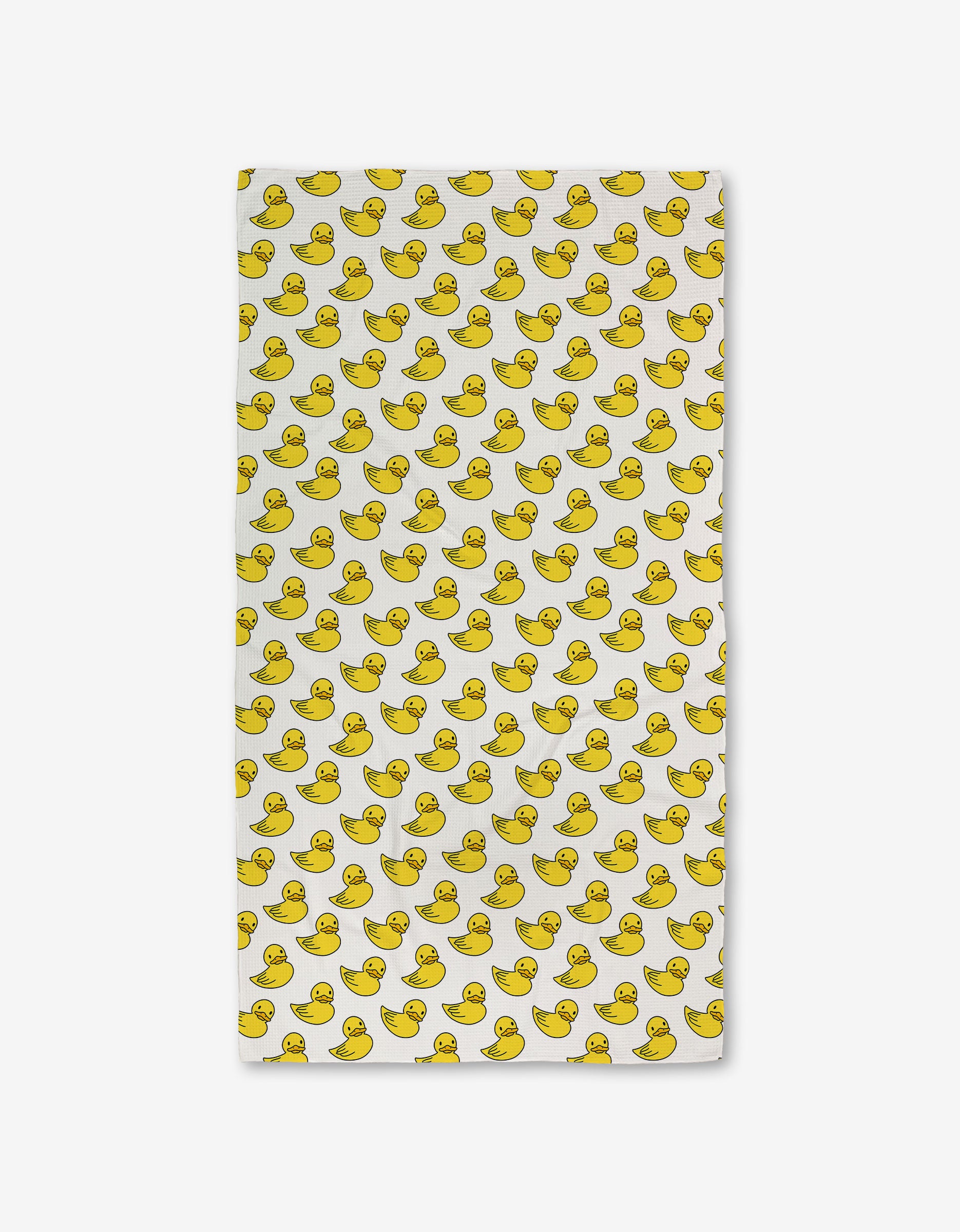 The GEOMETRY Duckies Luxe Bath Towel is a white rectangular towel with a playful yellow rubber duck pattern, crafted with ultra-absorbent Geoweave technology for soft and efficient drying.