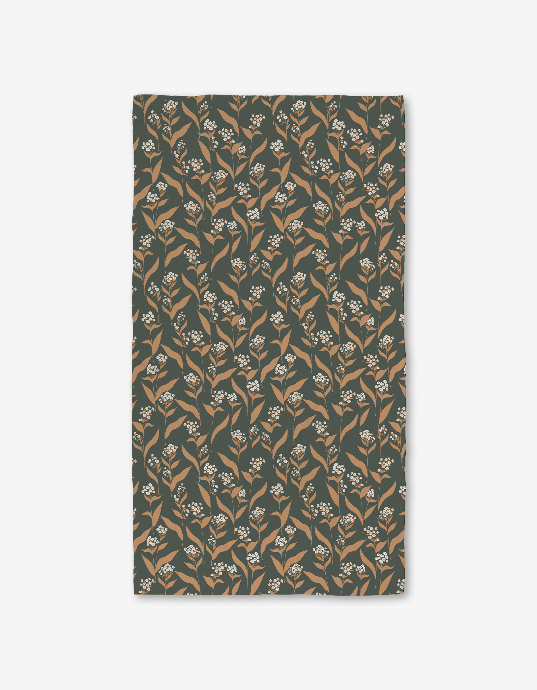 The Loretta bath towel by Charlie Rowan Designs features a rectangular shape and a beige and white floral pattern on dark green, crafted with Geoweave technology for ultra-absorbency.
