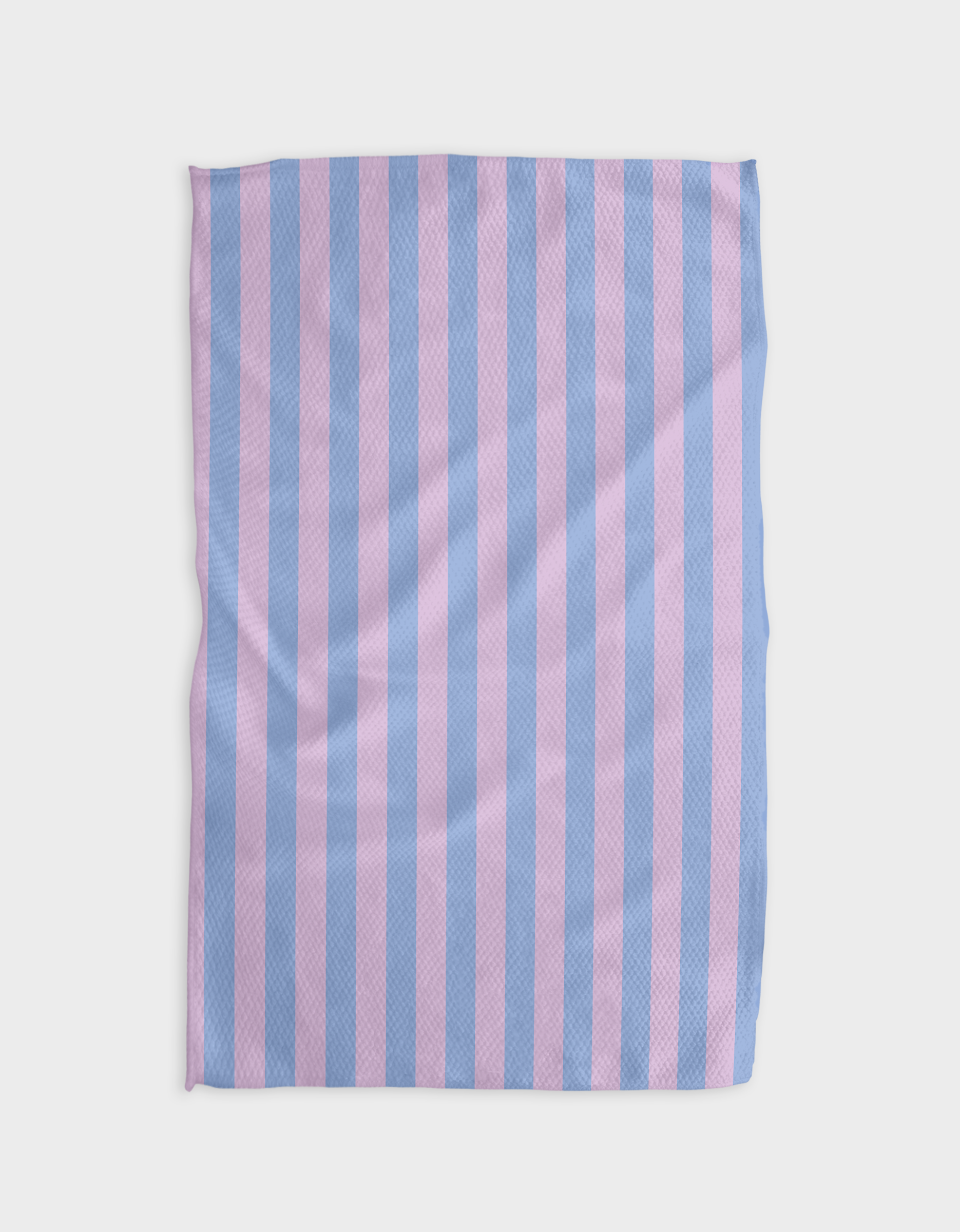 The Buy Guides Cabana Boy - Lilac French Blue tea towel, made from Geoweave fabric, has alternating light blue and pastel purple stripes and is shown flat on a white background with a lightly textured surface and minor creases.