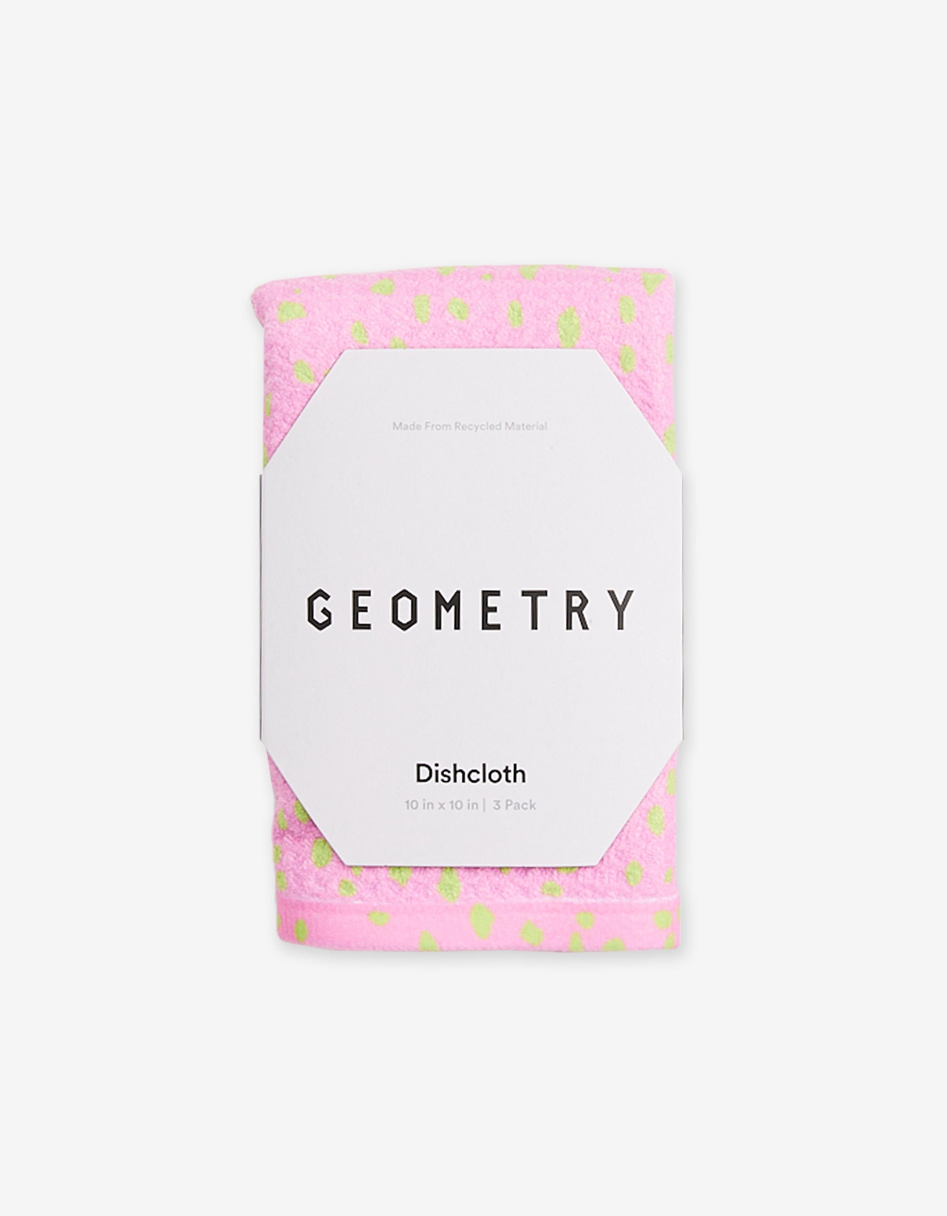 A green and pink patterned super-absorbent dishcloth is rolled up with a white geometric label displaying GEOMETRY and product details: Speckle Green Pink, Dishcloth, 10 x 10 in, 3 Pack in Geoweave fabric.