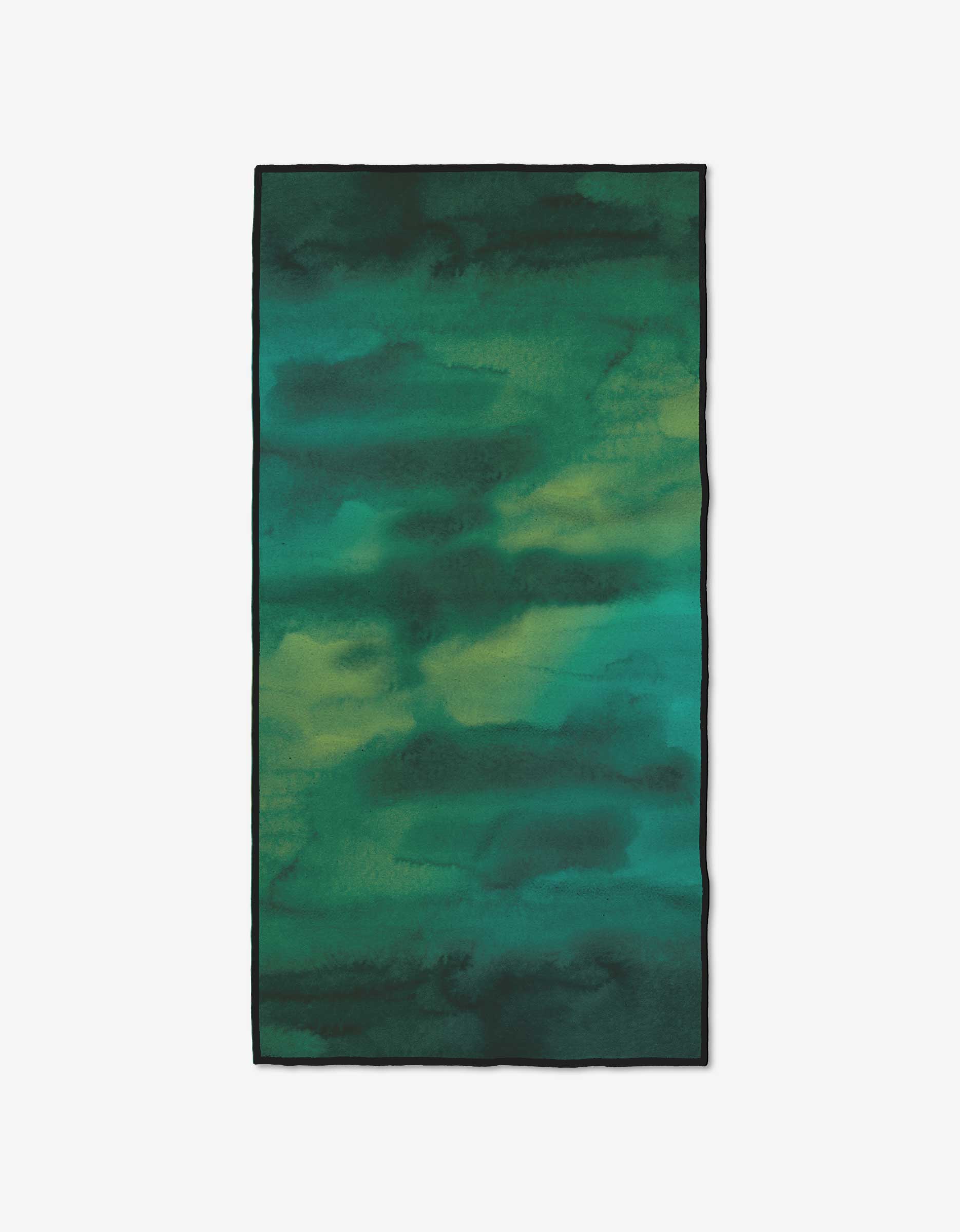 The GEOMETRY Greens Fitness Towel is rectangular, ultra-absorbent, and made from recycled materials, featuring a watercolor-inspired pattern in green and teal shades with soft transitions and a dark border.