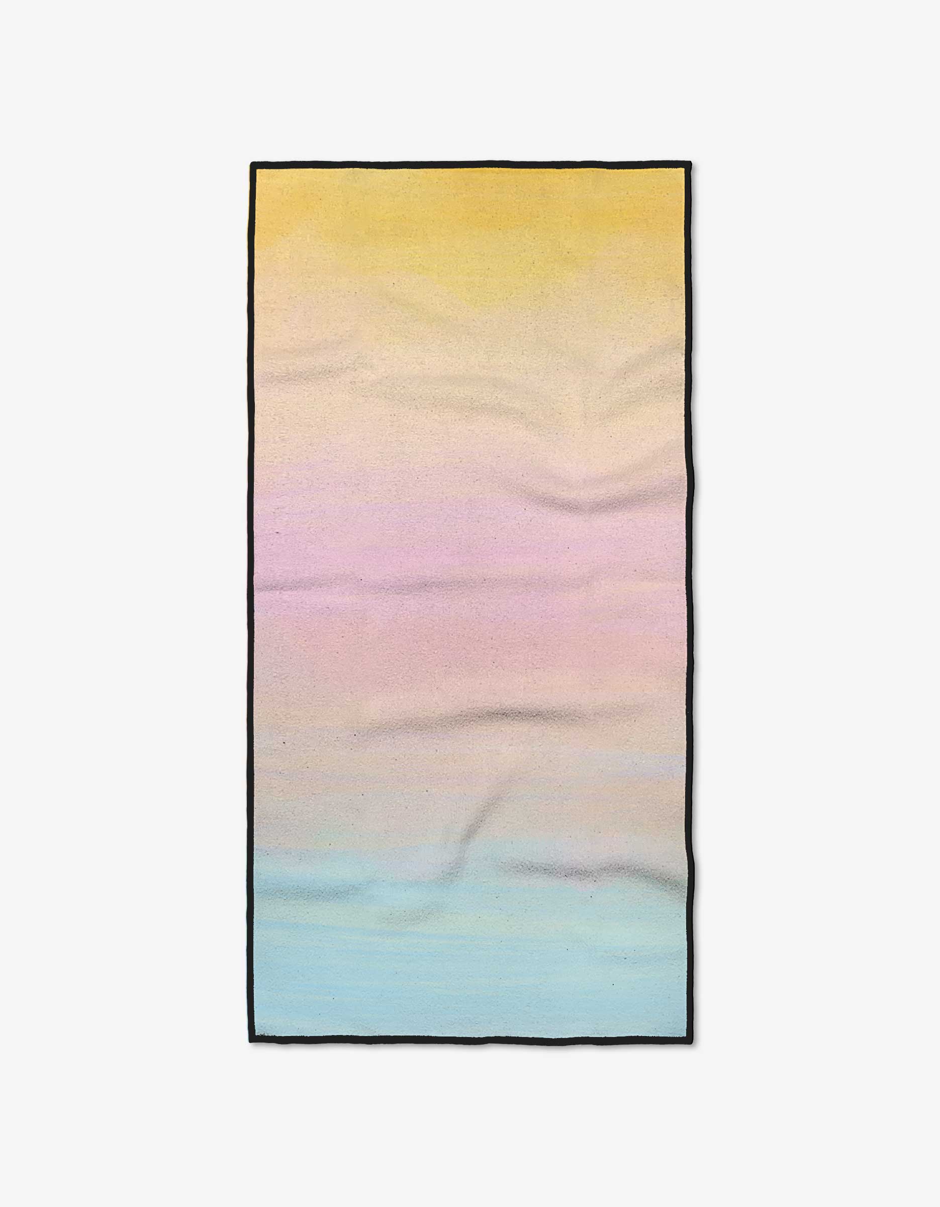 The Sunrise rug by GEOMETRY is a rectangular piece made from recycled materials, displaying a soft gradient—yellow top, pink and purple center, light blue bottom—with a thin black border and subtle wrinkling.